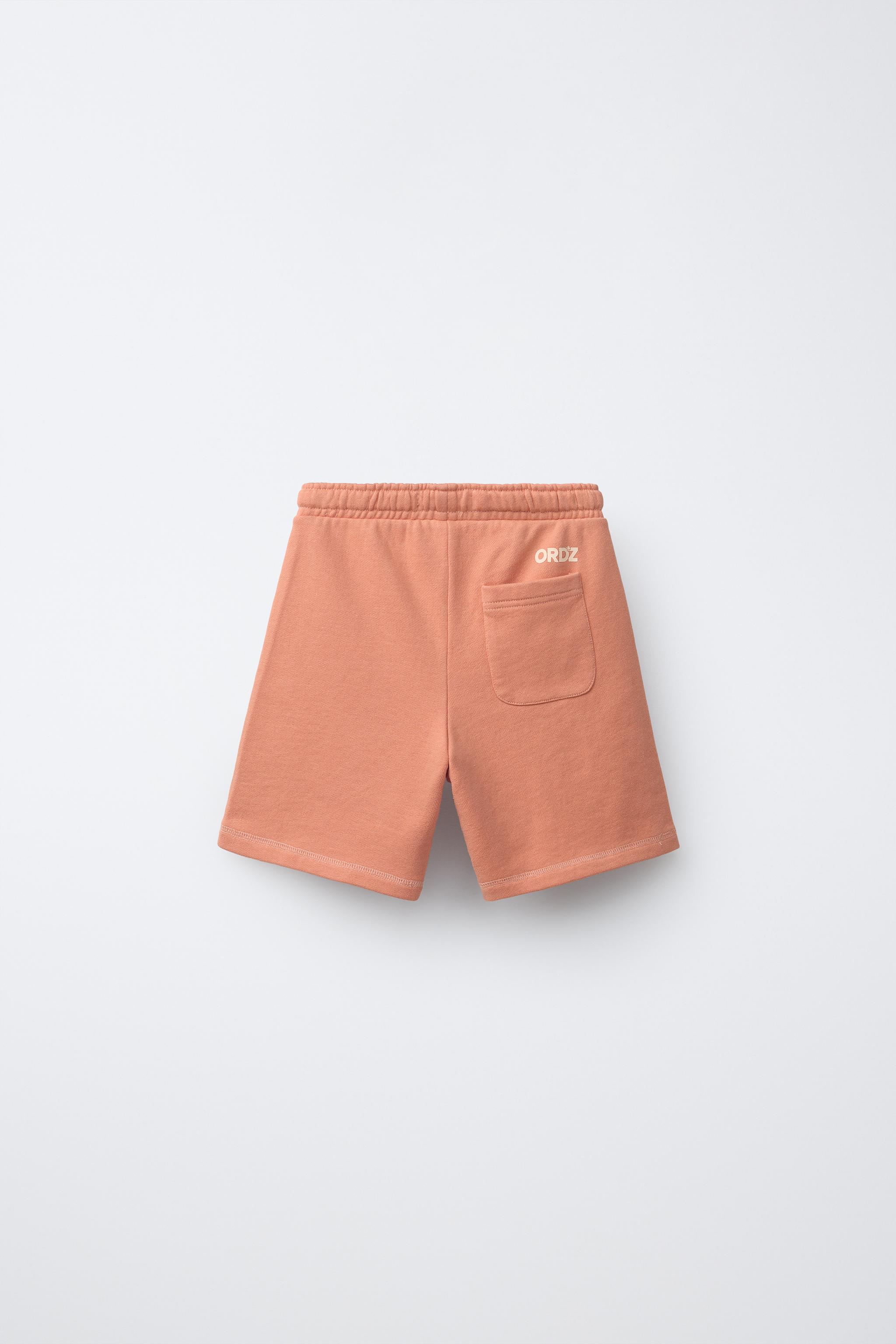 GARMENT DYED LOGO PLUSH SHORTS