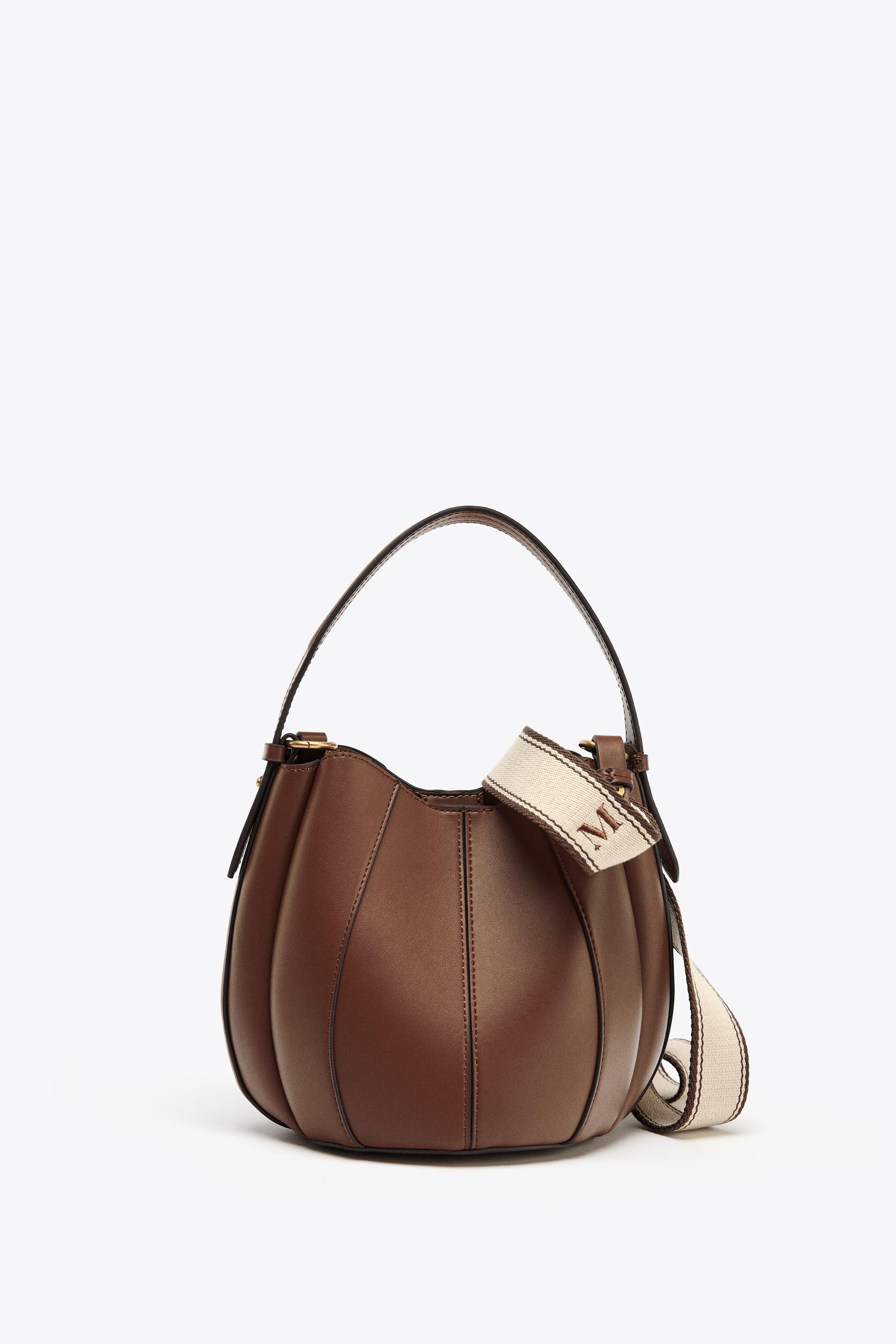 TOPSTITCHED BUCKET BAG