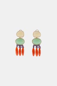 Dvoubarevn� n�u�nice s ov�ln�mi d�ly v zelen� a b�ov� barv� a s fialov�mi a oran�ov�mi kor�lkov�mi st�apci.