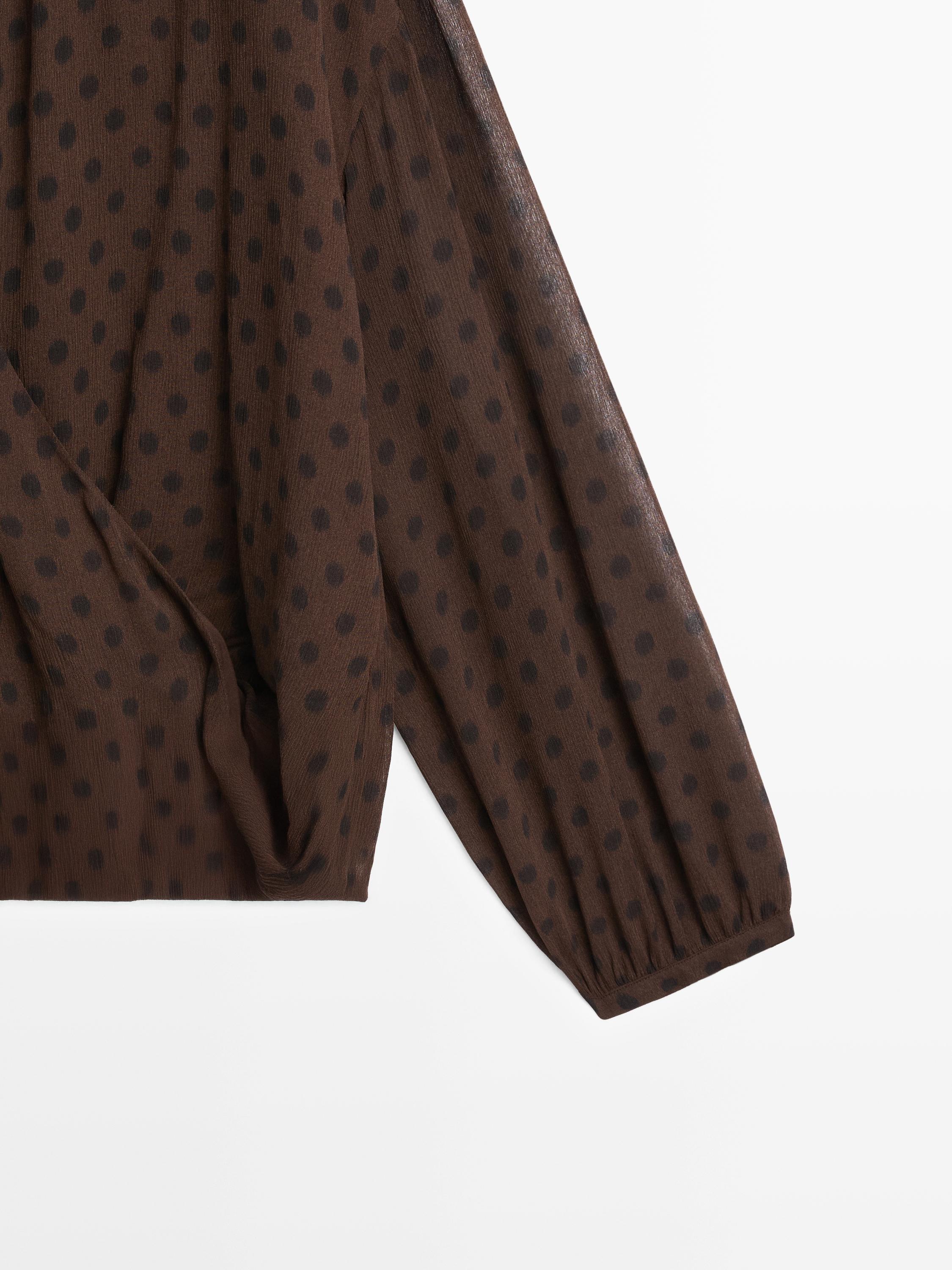 Flowing surplice polka dot blouse