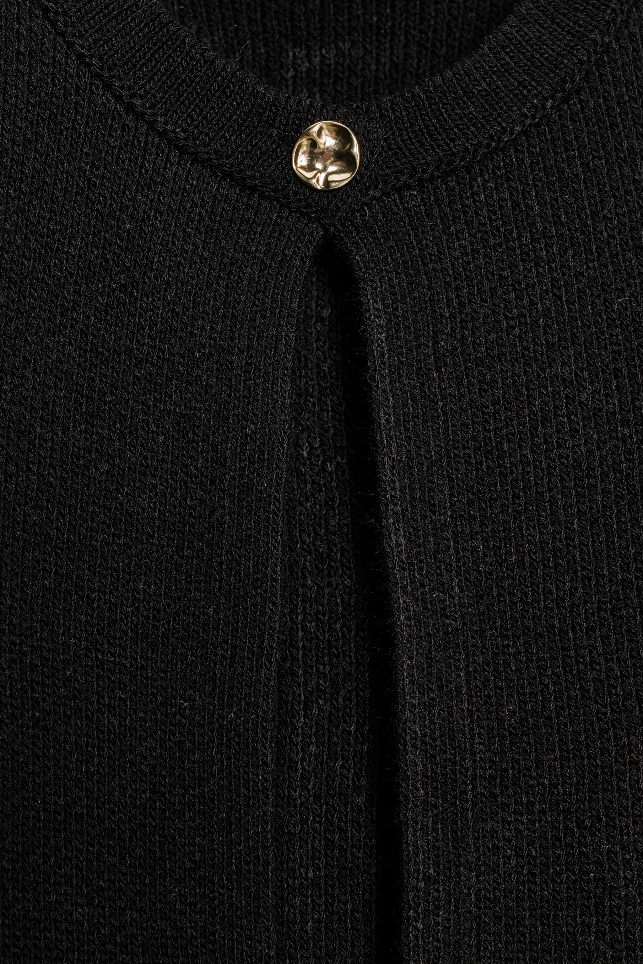 FRINGED KNIT CARDIGAN