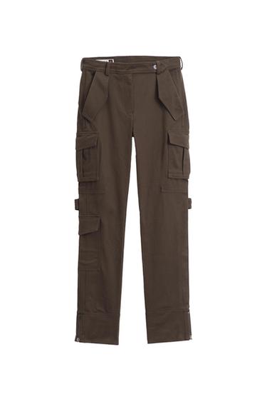 Front view of brown cargo trousers with side pockets and ankle fastenings.