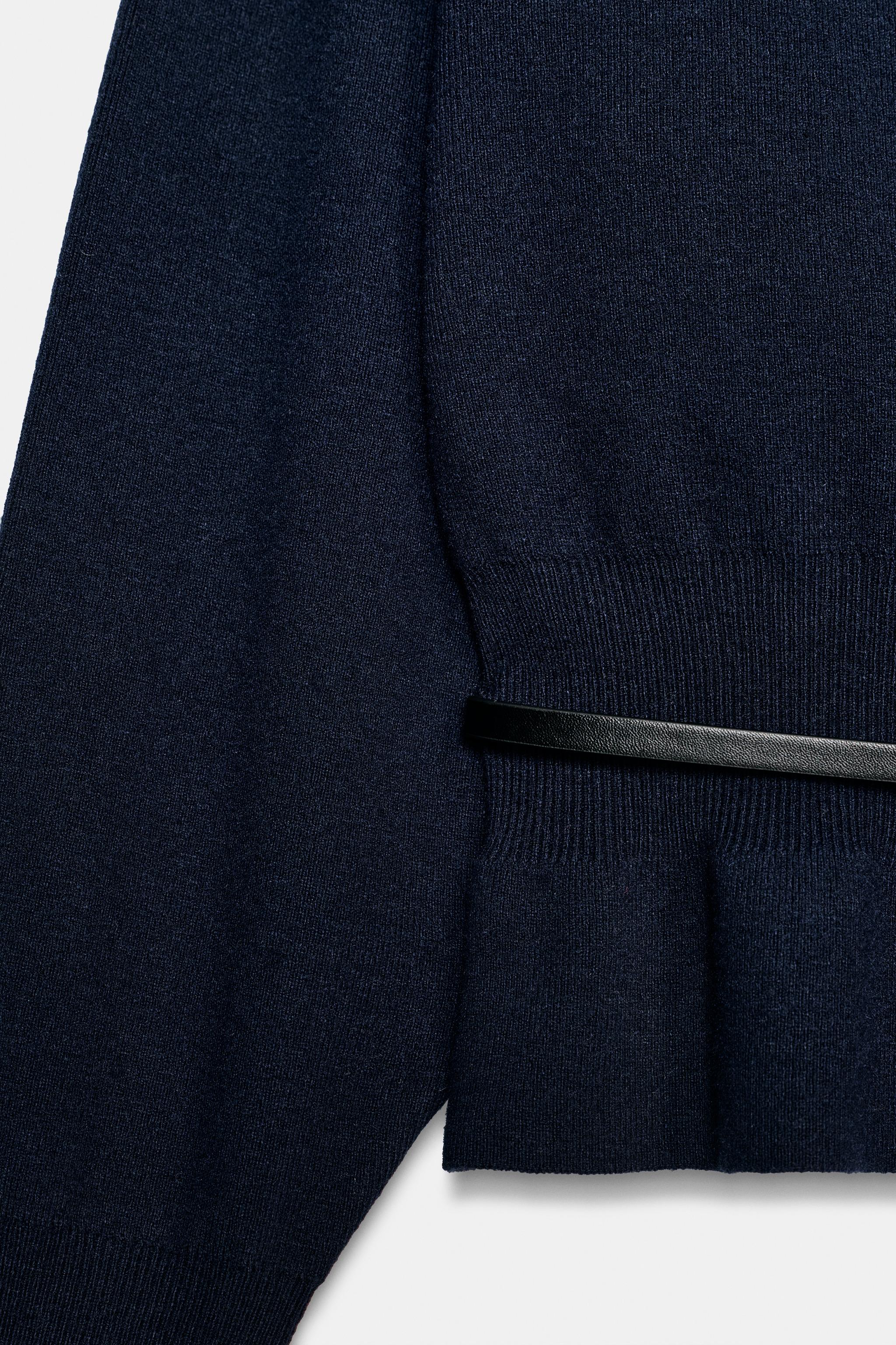 PULL EN MAILLE AVEC CEINTURE