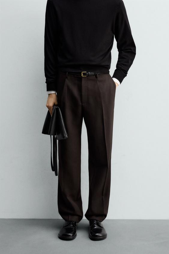 100% WOOL PLEATED TROUSERS