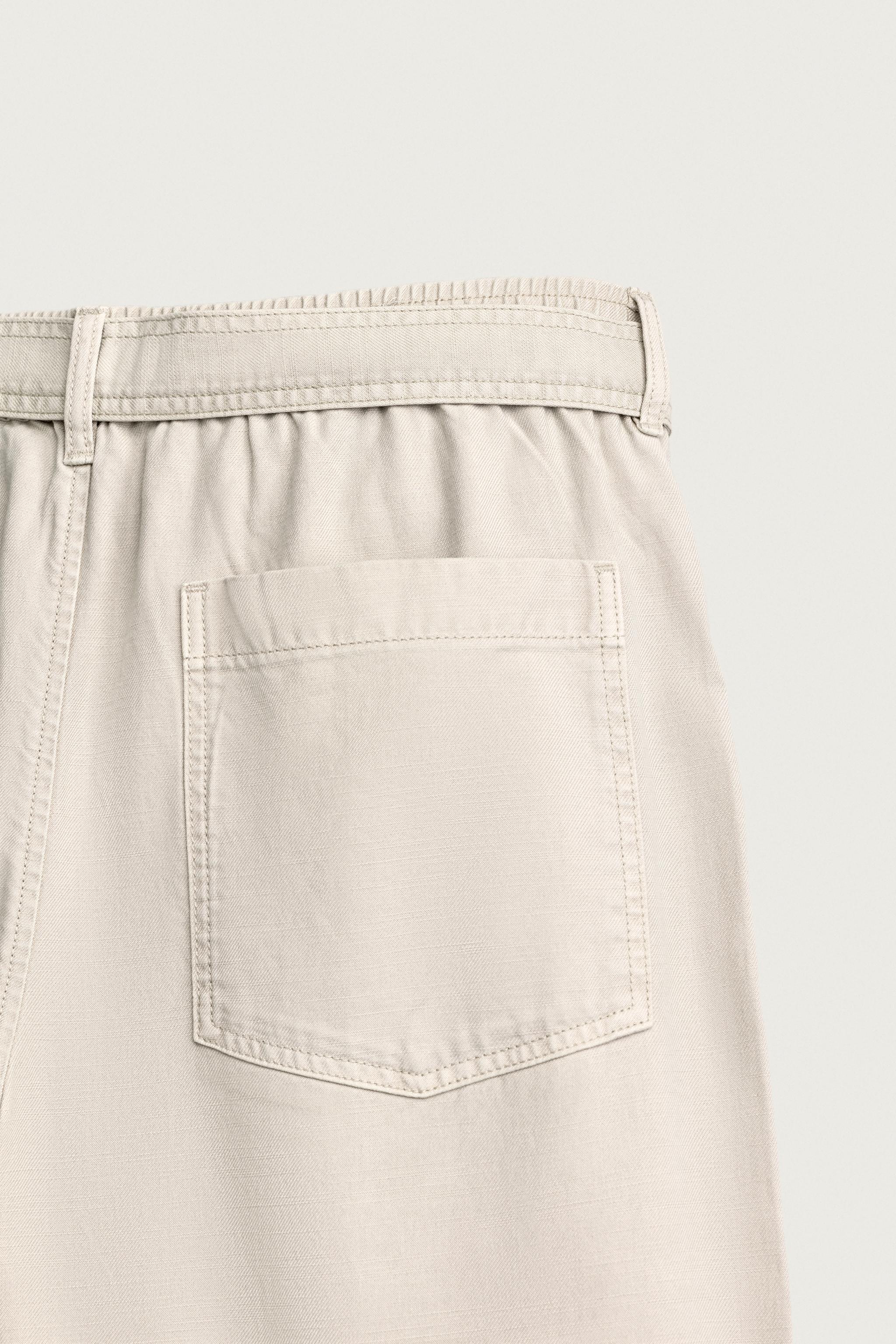PANTALON COUPE DÉCONTRACTÉE À PLIS AVEC CEINTURE