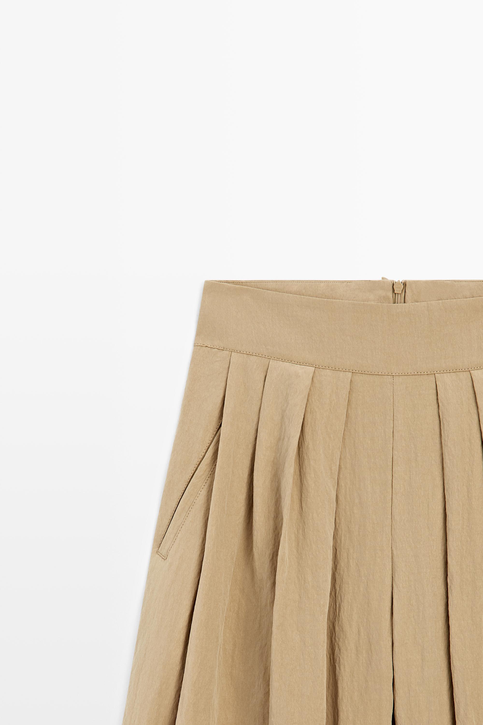Pantalon palazzo à plis