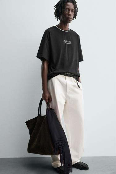 T-SHIRT WITH TEXTURED SLOGAN PRINT - Black by Zara - Image 4