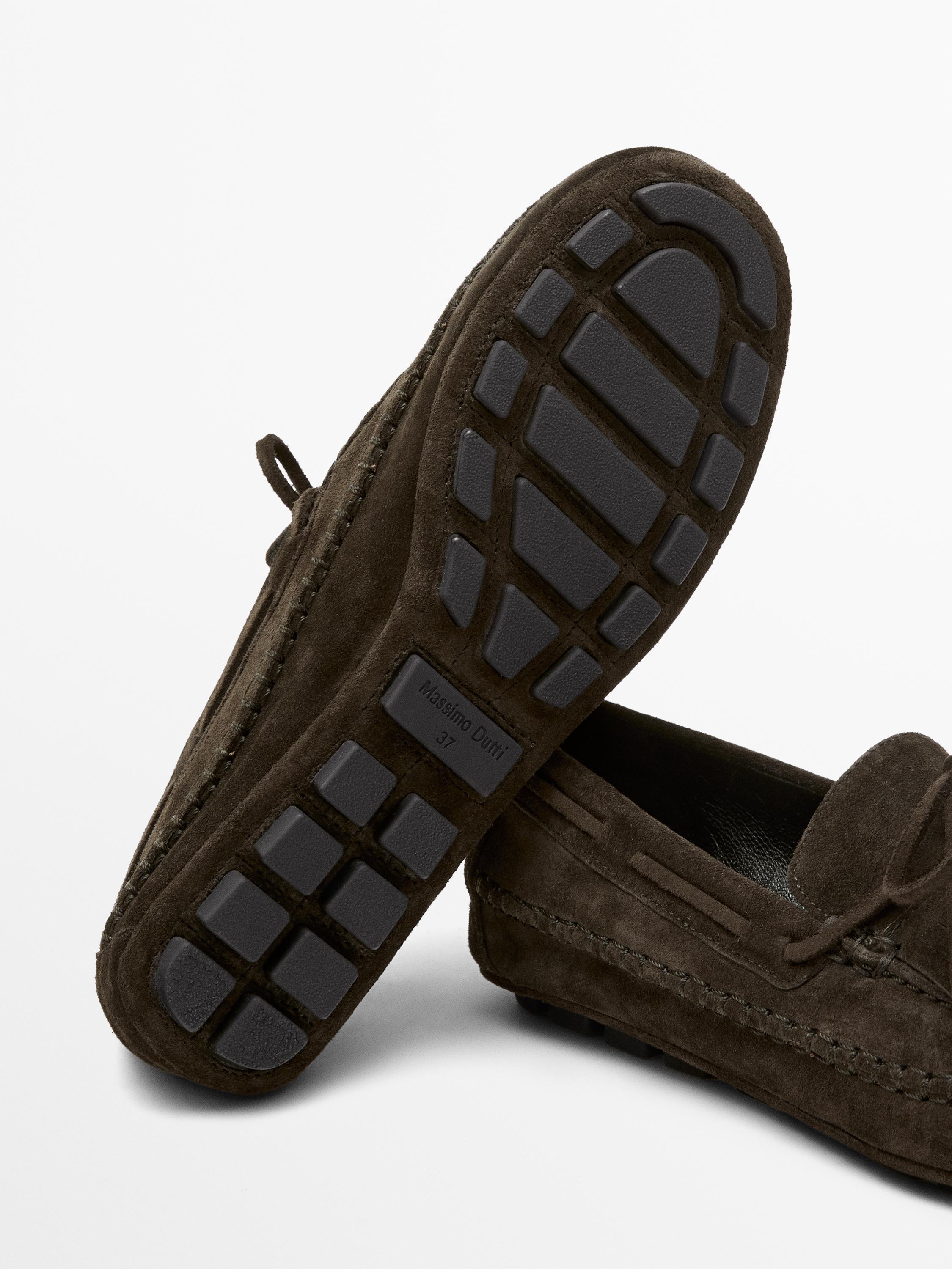 Split suede loafers with fringing and tassels