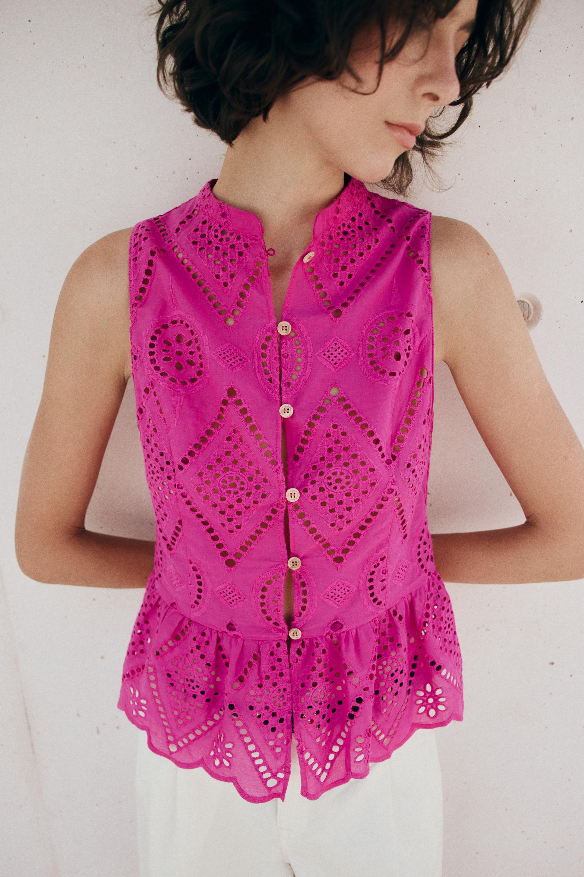 EMBROIDERED EYELET PEPLUM TOP