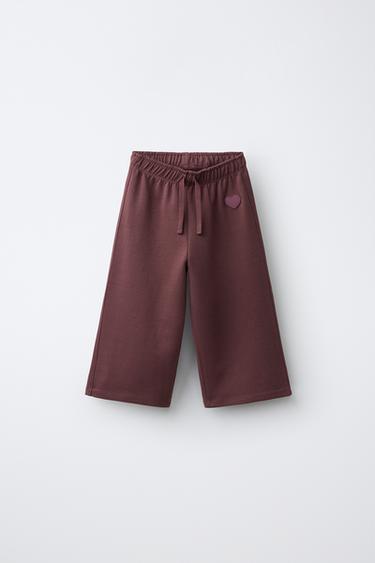 PANTALON EN MOLLETON LARGE CŒUR INTERLOCK - Chocolat de Zara