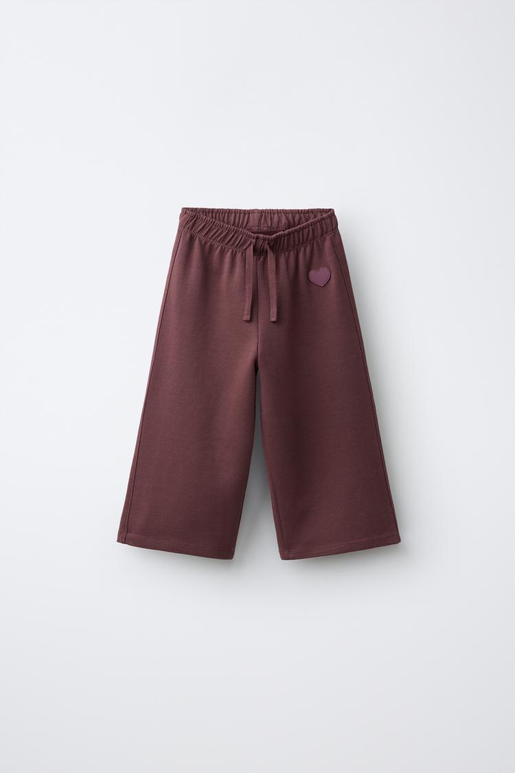 PANTALÓN FELPA WIDE LEG CORAZÓN INTERLOCK