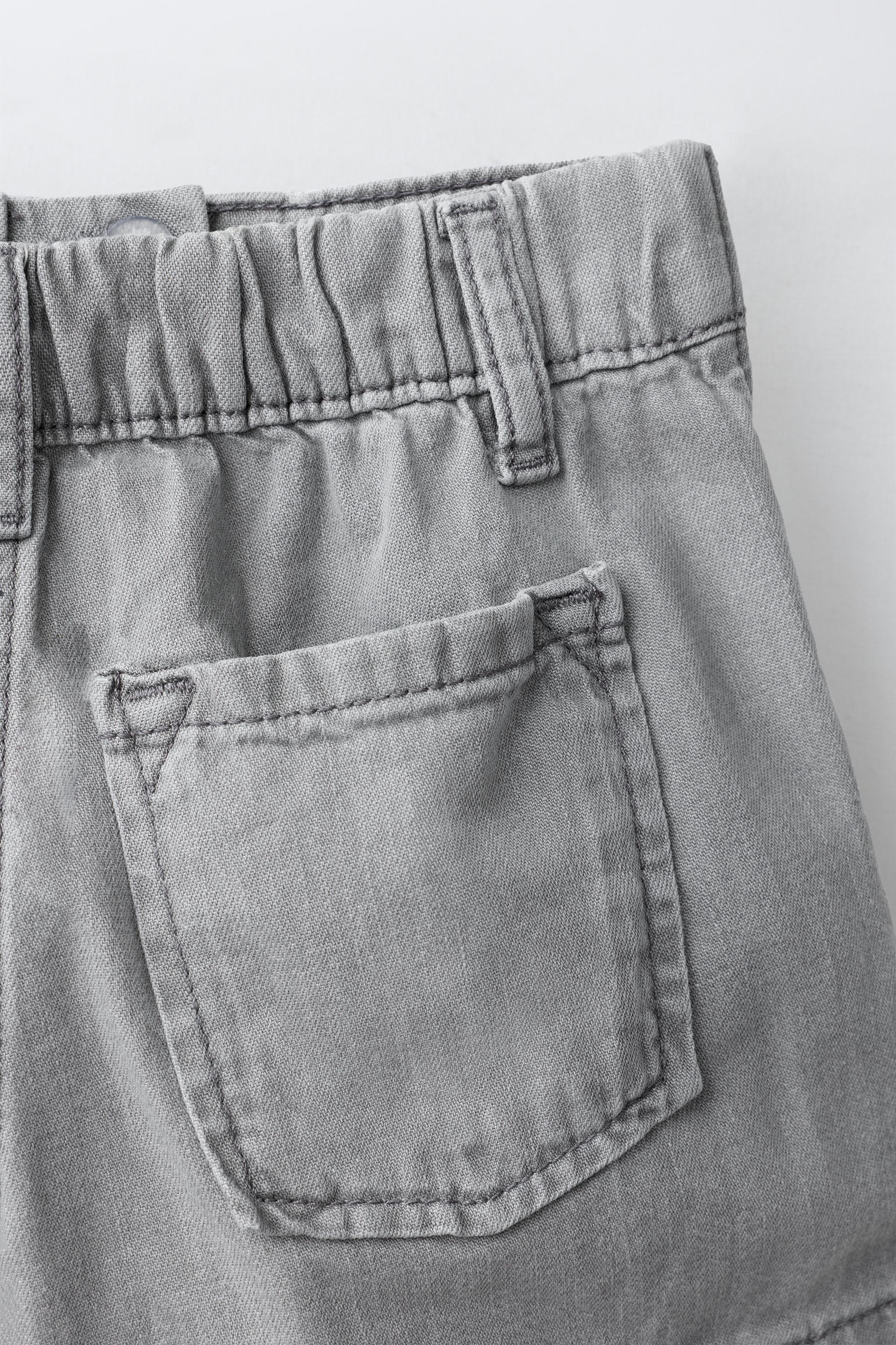 JUPE-SHORT EN JEAN À CLOUS