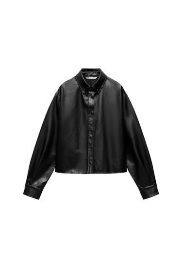 Front view of a black button-down shirt with a classic collar.