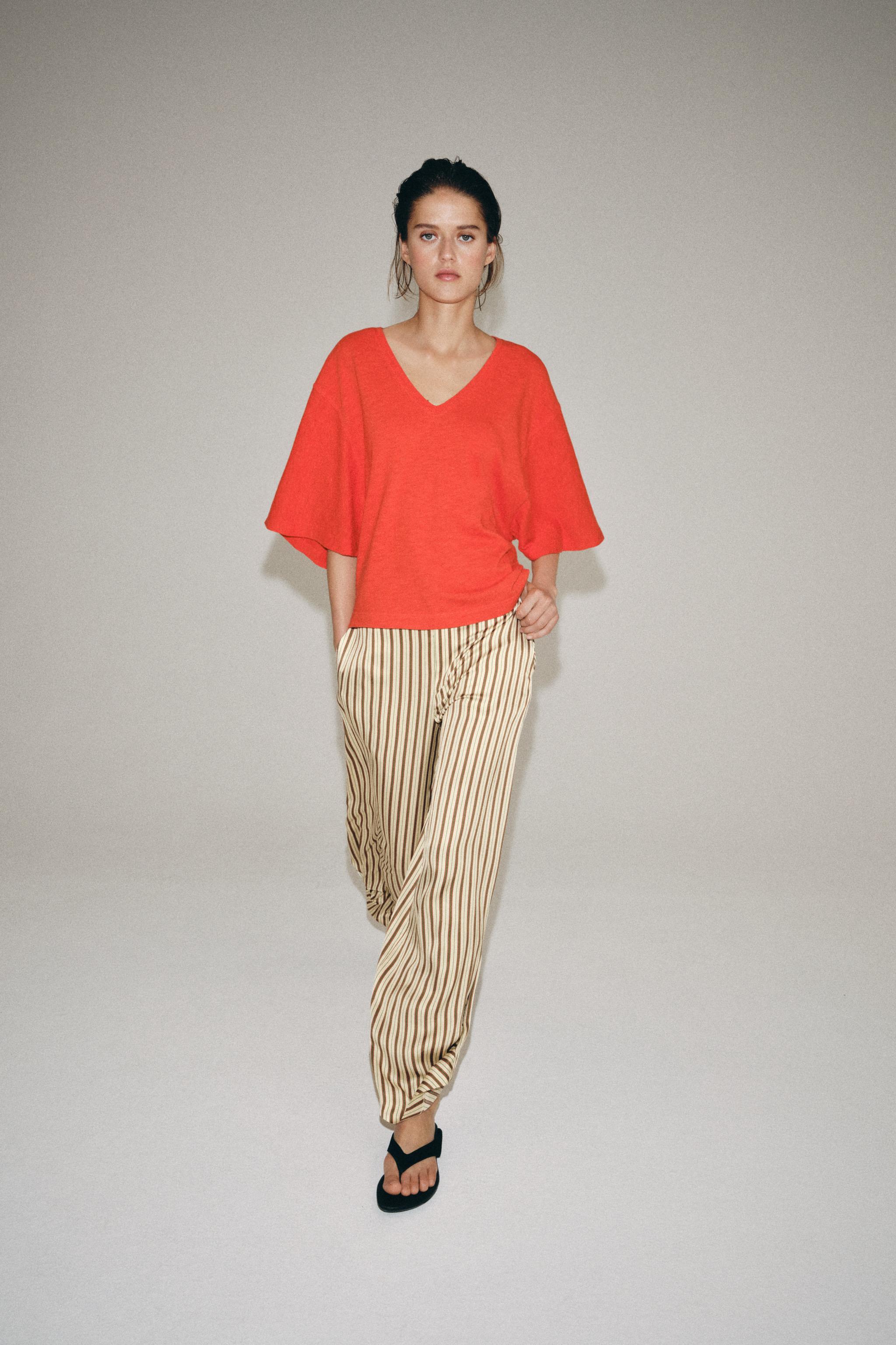 V-NECK T-SHIRT — Coral