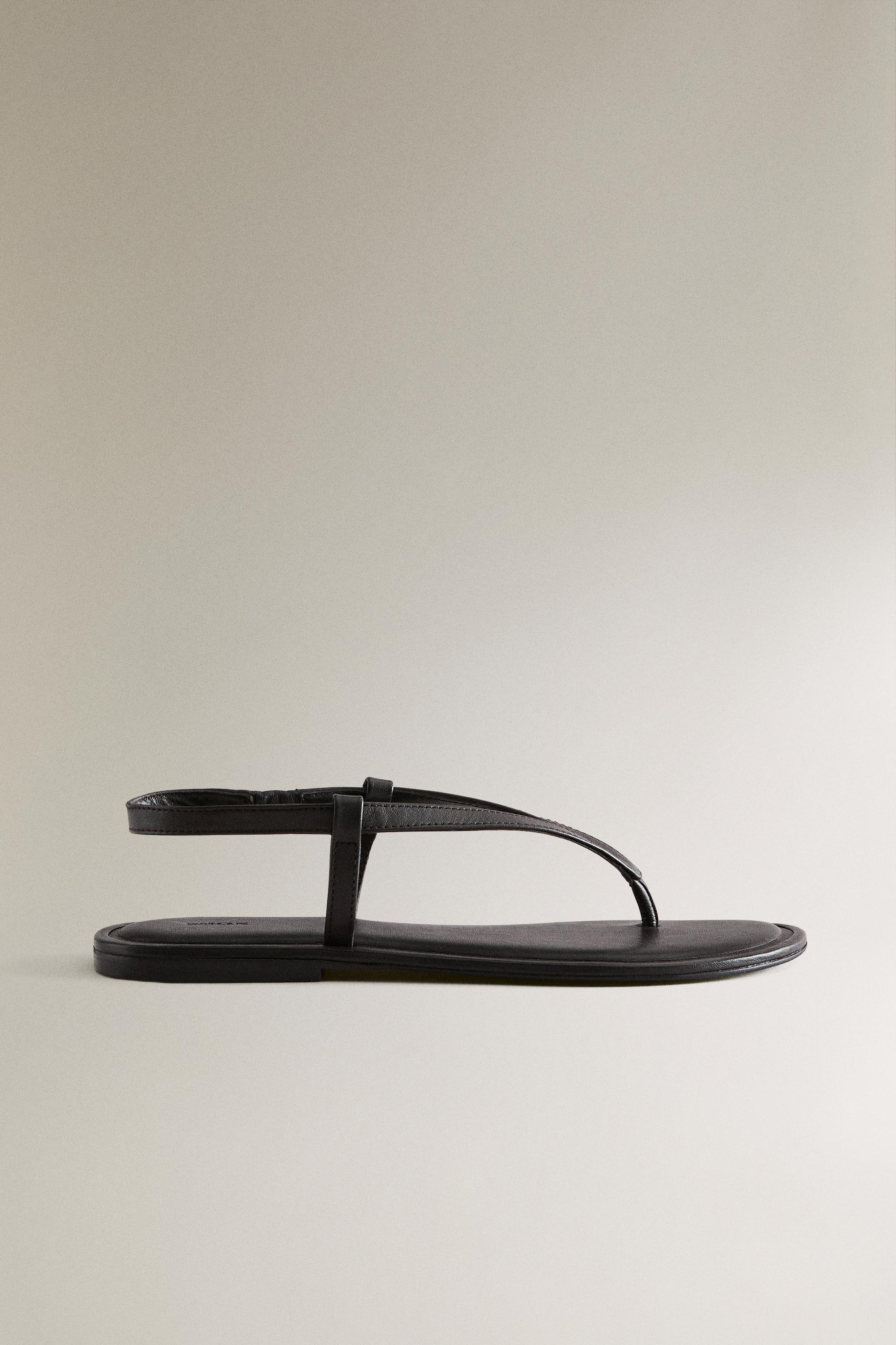 SANDALE PLATE EN CUIR