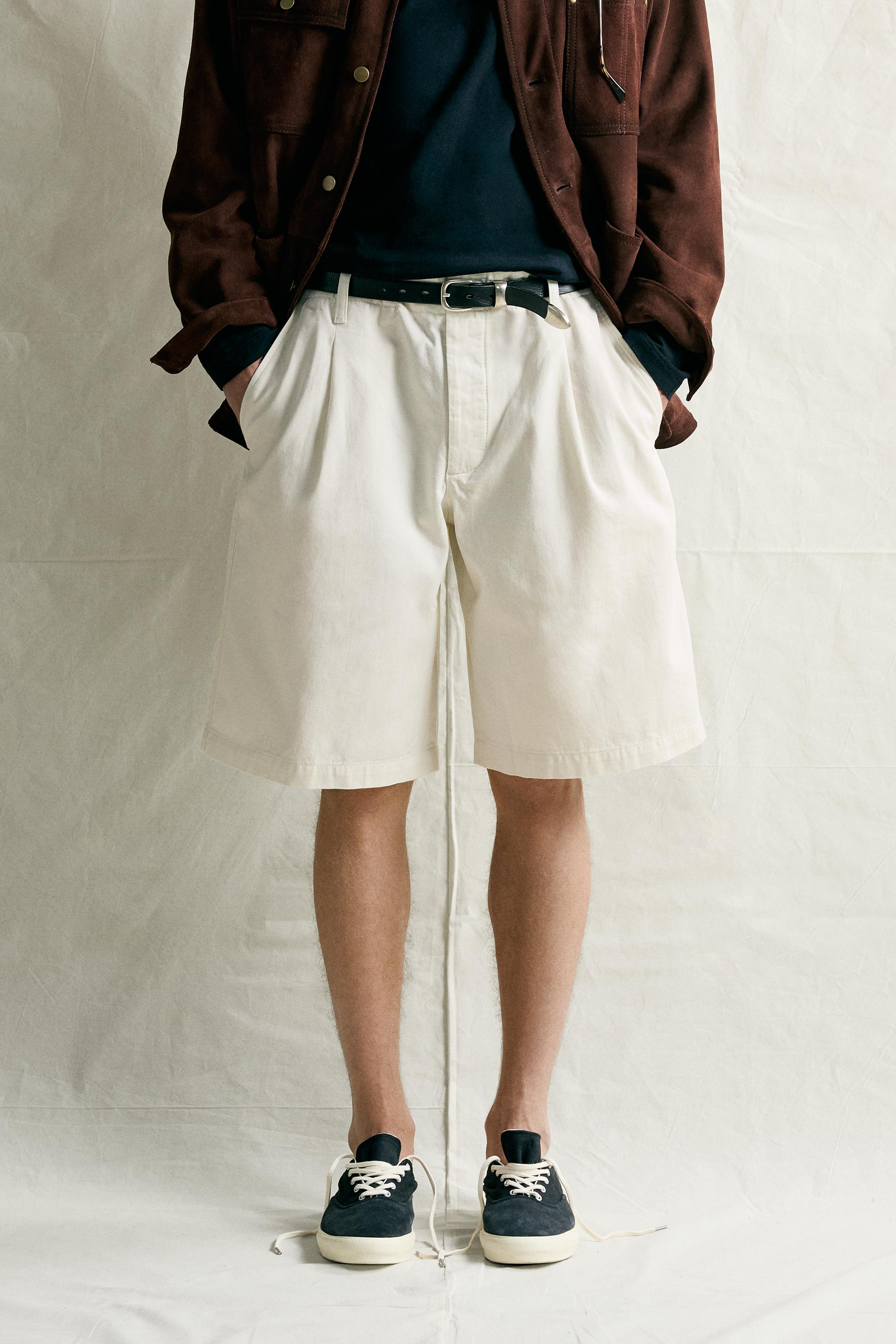 RELAXED-FIT PLEATED BERMUDA SHORTS — Oyster-white