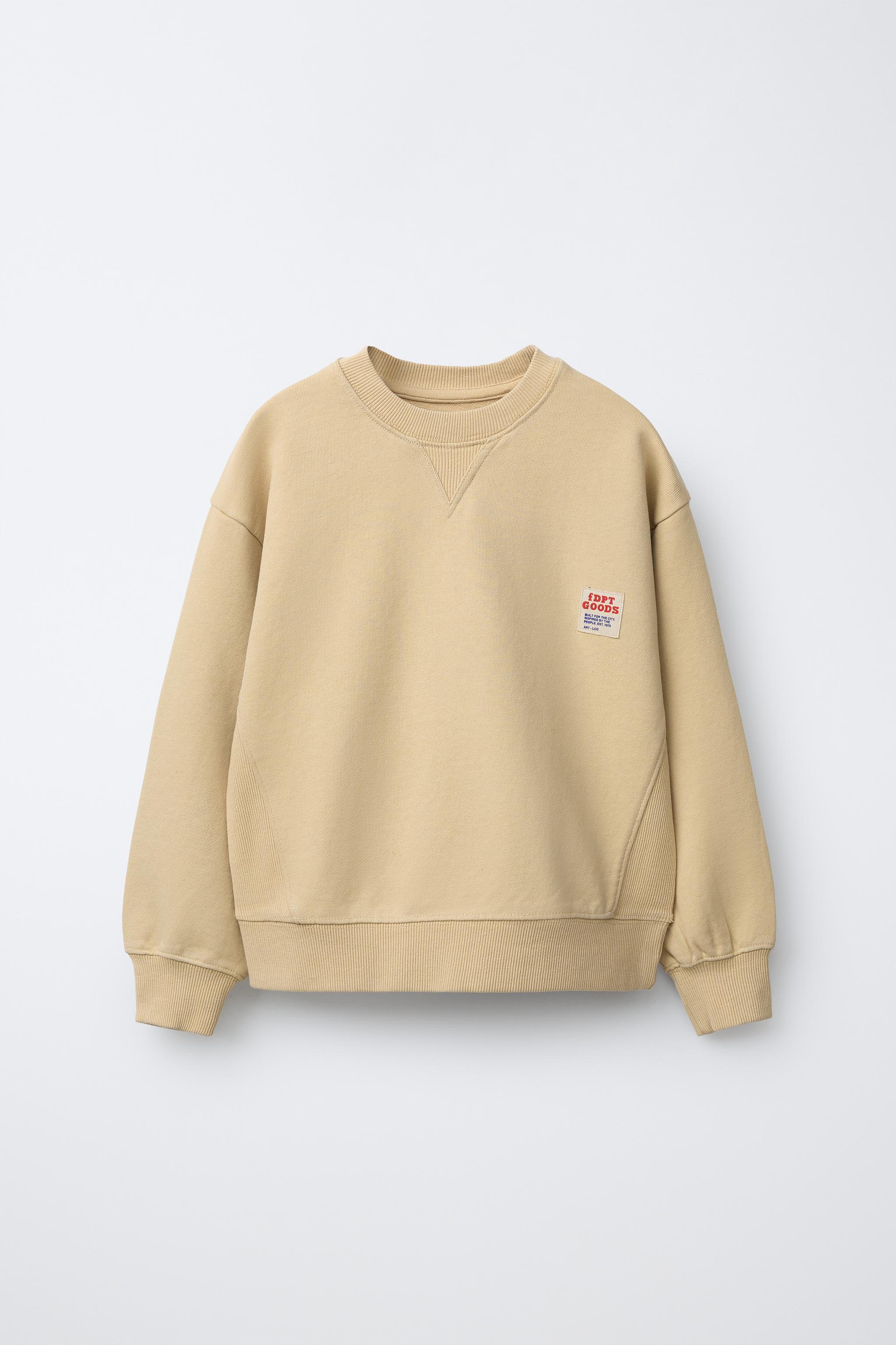 SWEAT TEINT EN PIÈCE ÉTIQUETTE