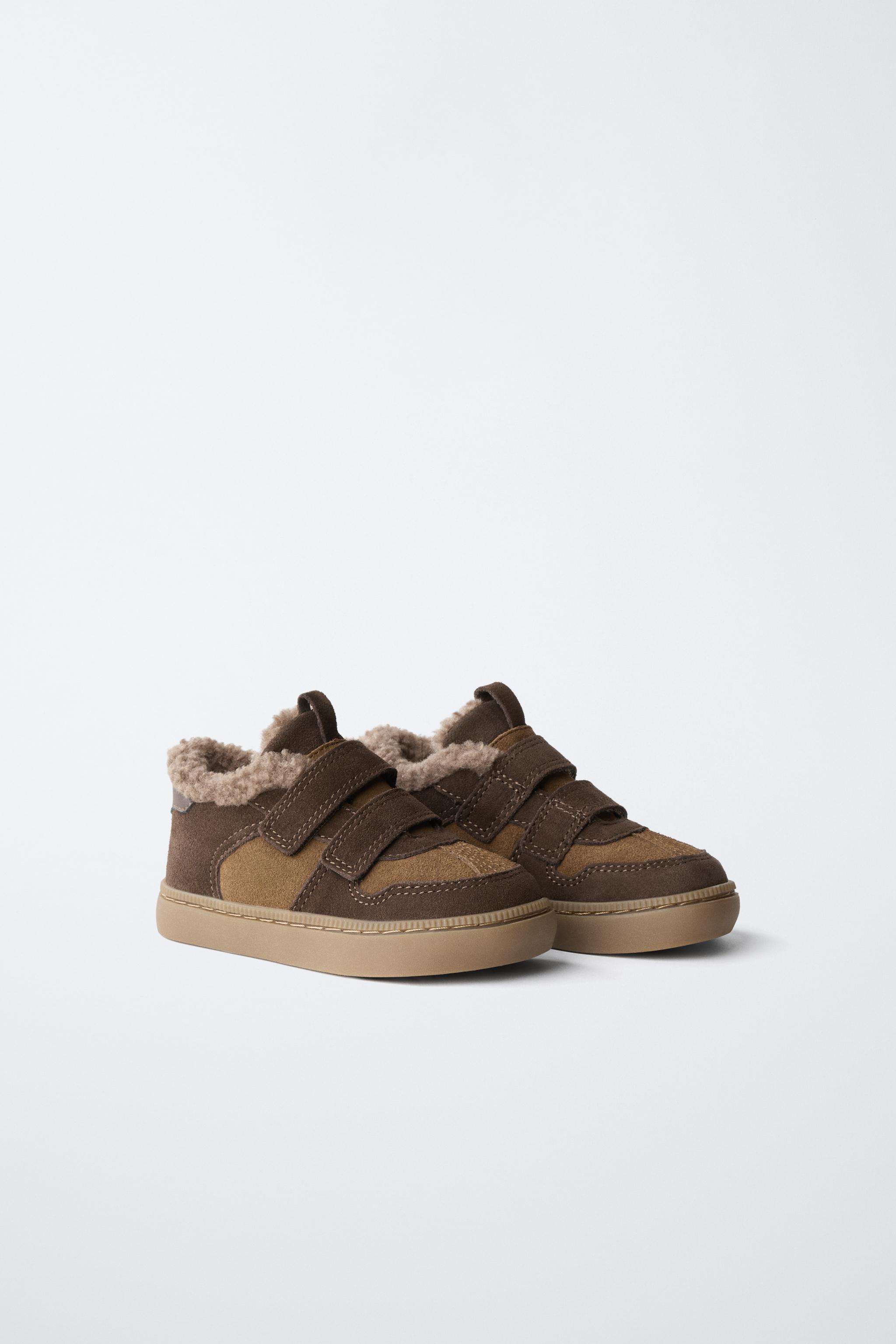 BASKETS MONTANTES EN CUIR