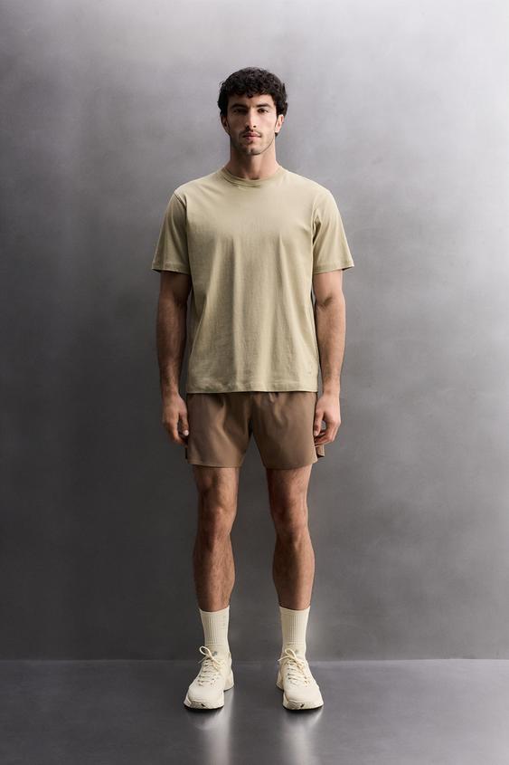 CAMISETA ALGODÓN ENTRENAMIENTO BÁSICA - Verde claro de Zara - Imagen 0