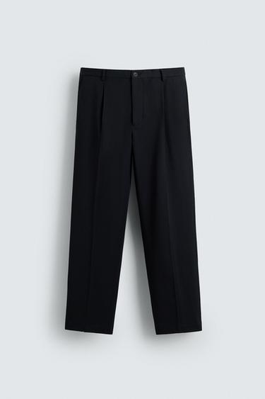 PANTALÓN REGULAR FIT PLIEGUES - Marino de Zara