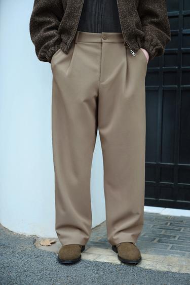 RELAXED FIT PLEATED TROUSERS - Light tan by Zara