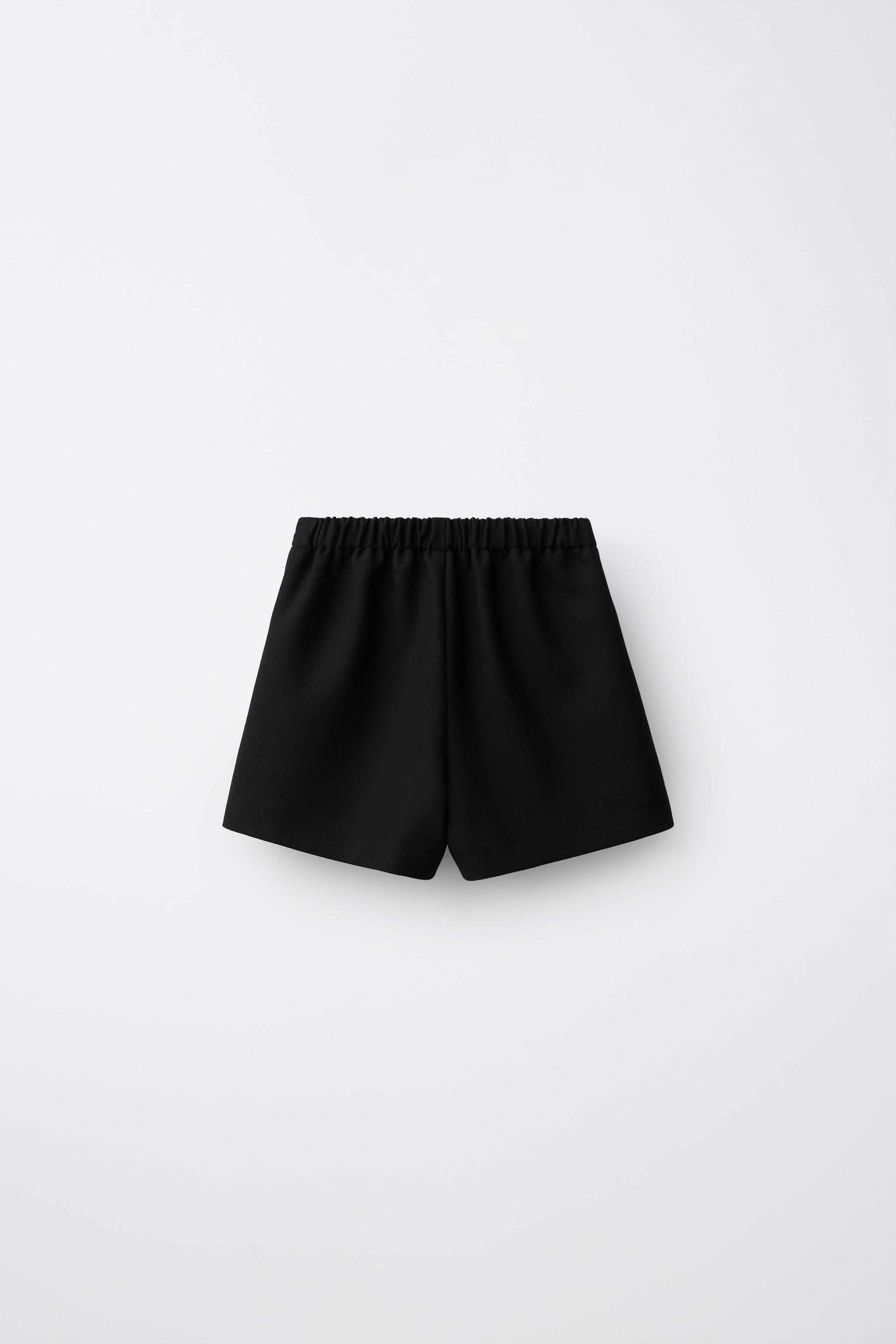 POLKA-DOT BOW BERMUDA SKIRT — Black