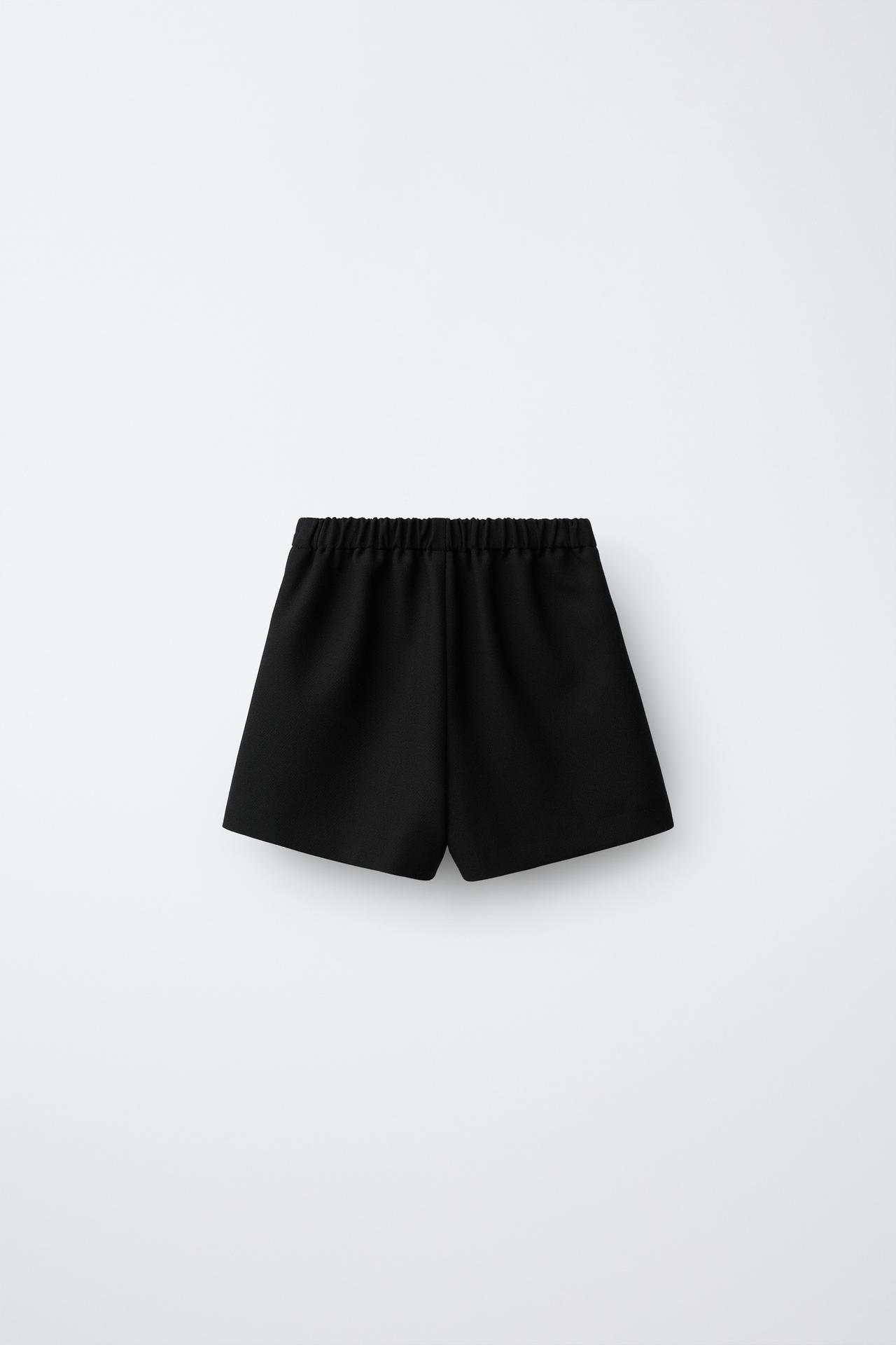 POLKA-DOT BOW BERMUDA SKIRT — Black