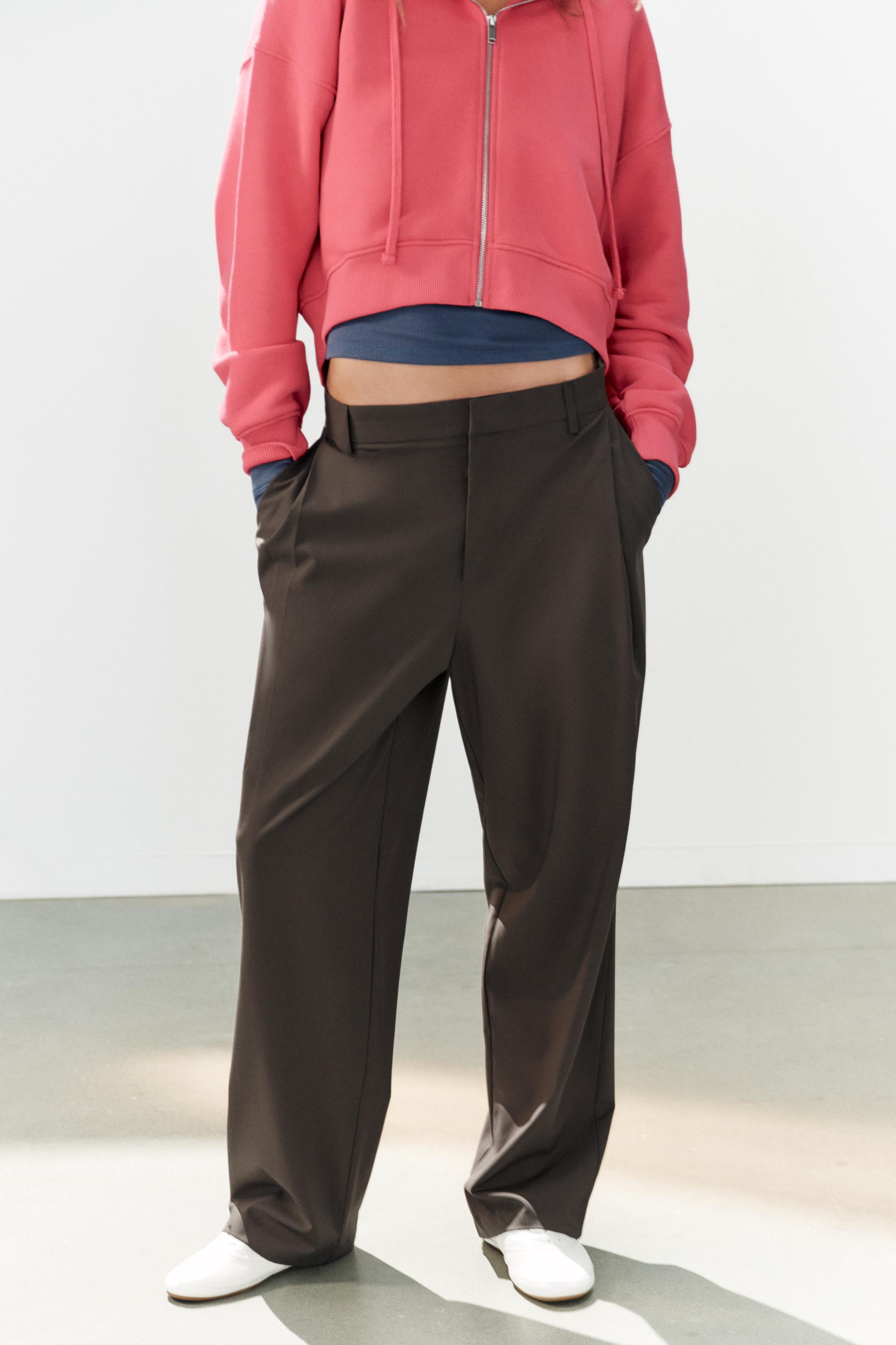 STRIPED PLEATED PANTS