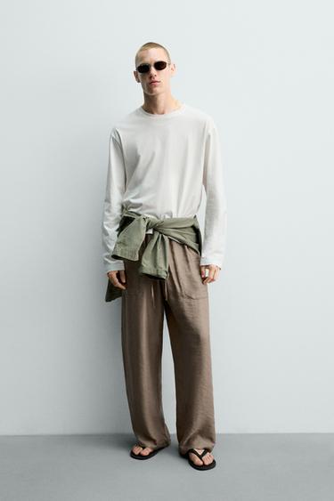 PANTALÓN FLUIDO RELAXED FIT - rosa claro de Zara