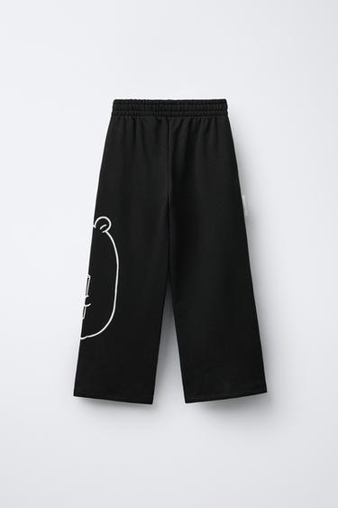 PANTALON EN MOLLETON À JAMBES LARGES CAPIBARA CAPYFUN © - Noir de Zara - Image 1