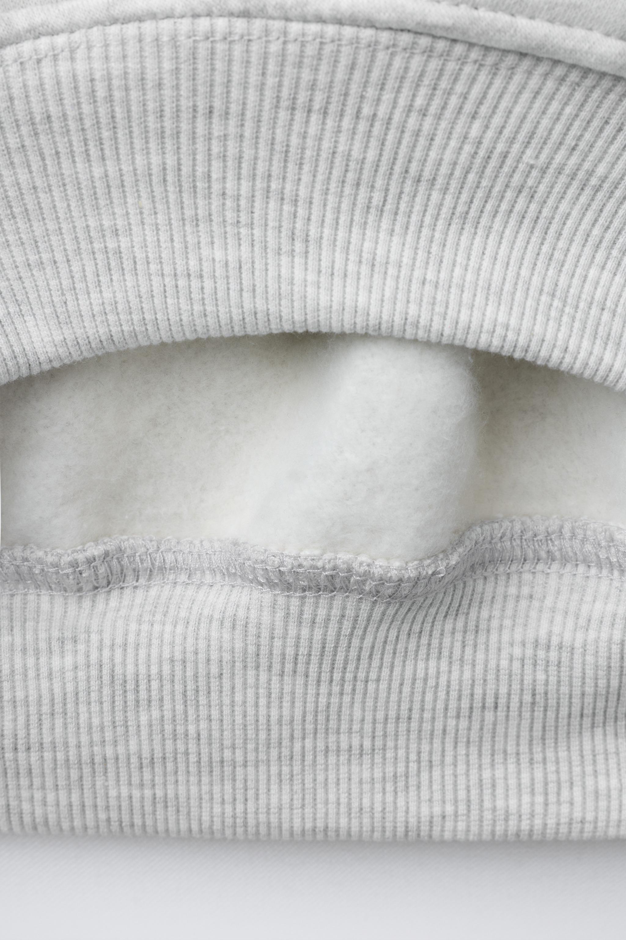 SWEAT À CAPUCHE CERISES