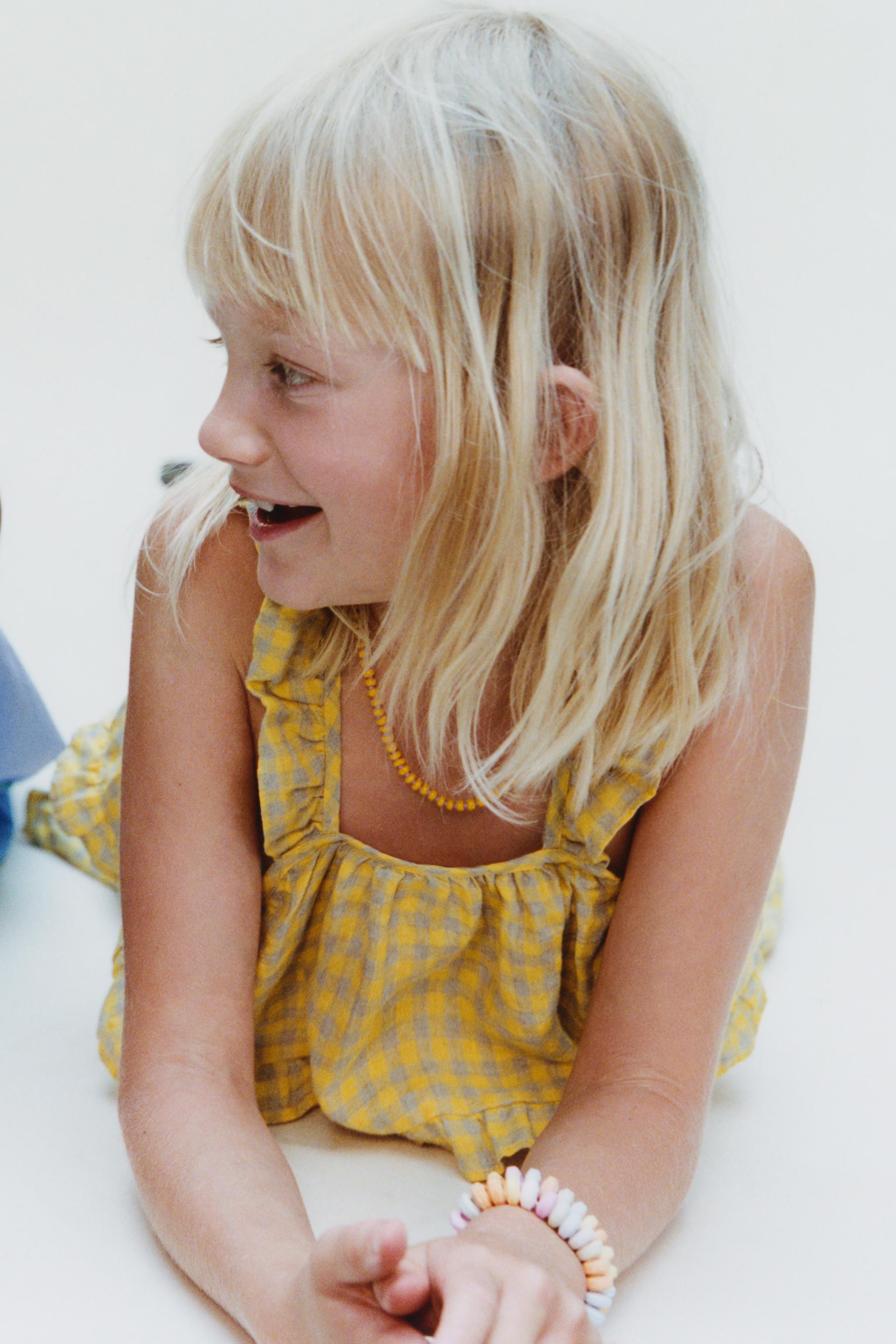 GINGHAM AND RUFFLE 100% LINEN JUMPSUIT