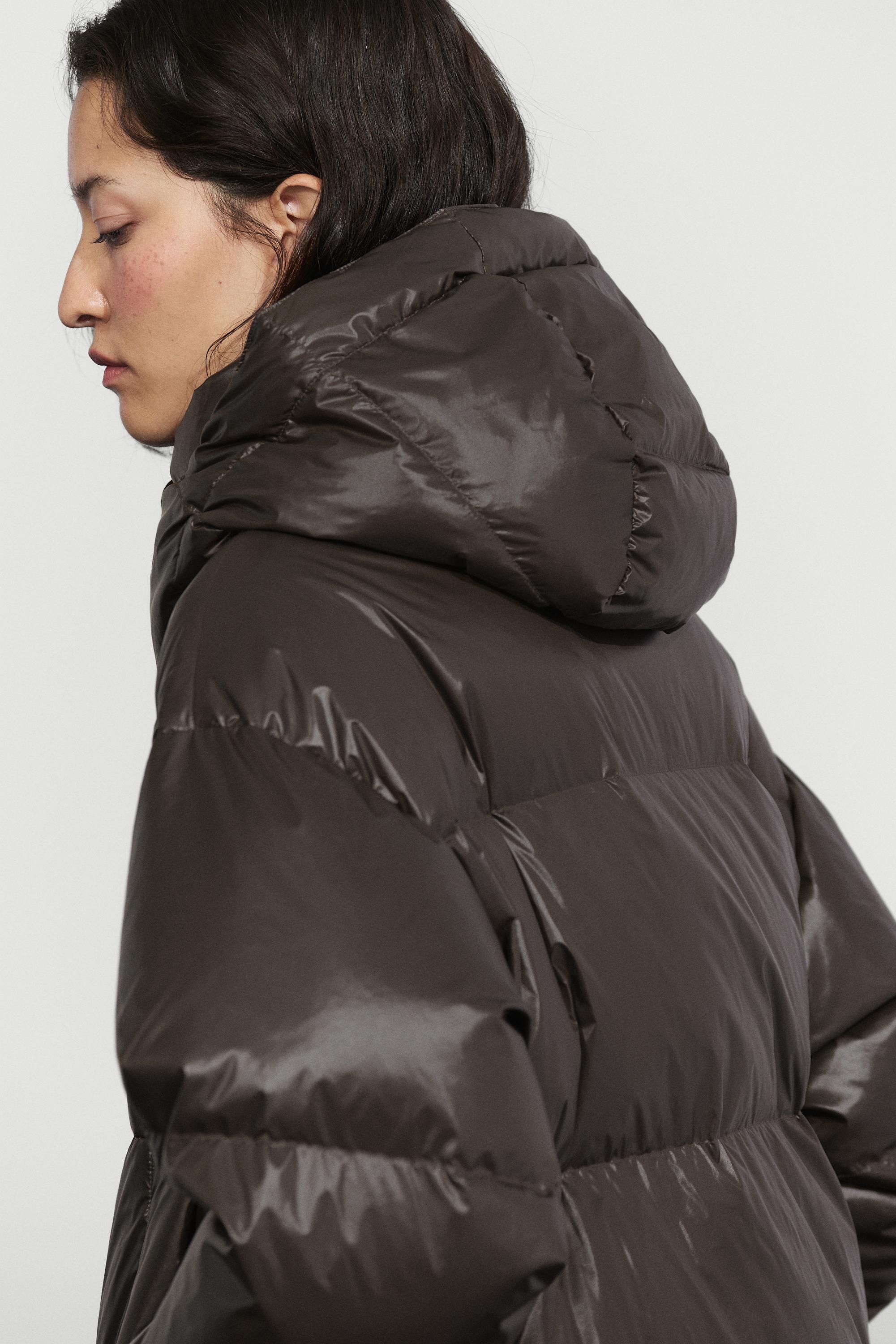 Down jacket with mitten detail