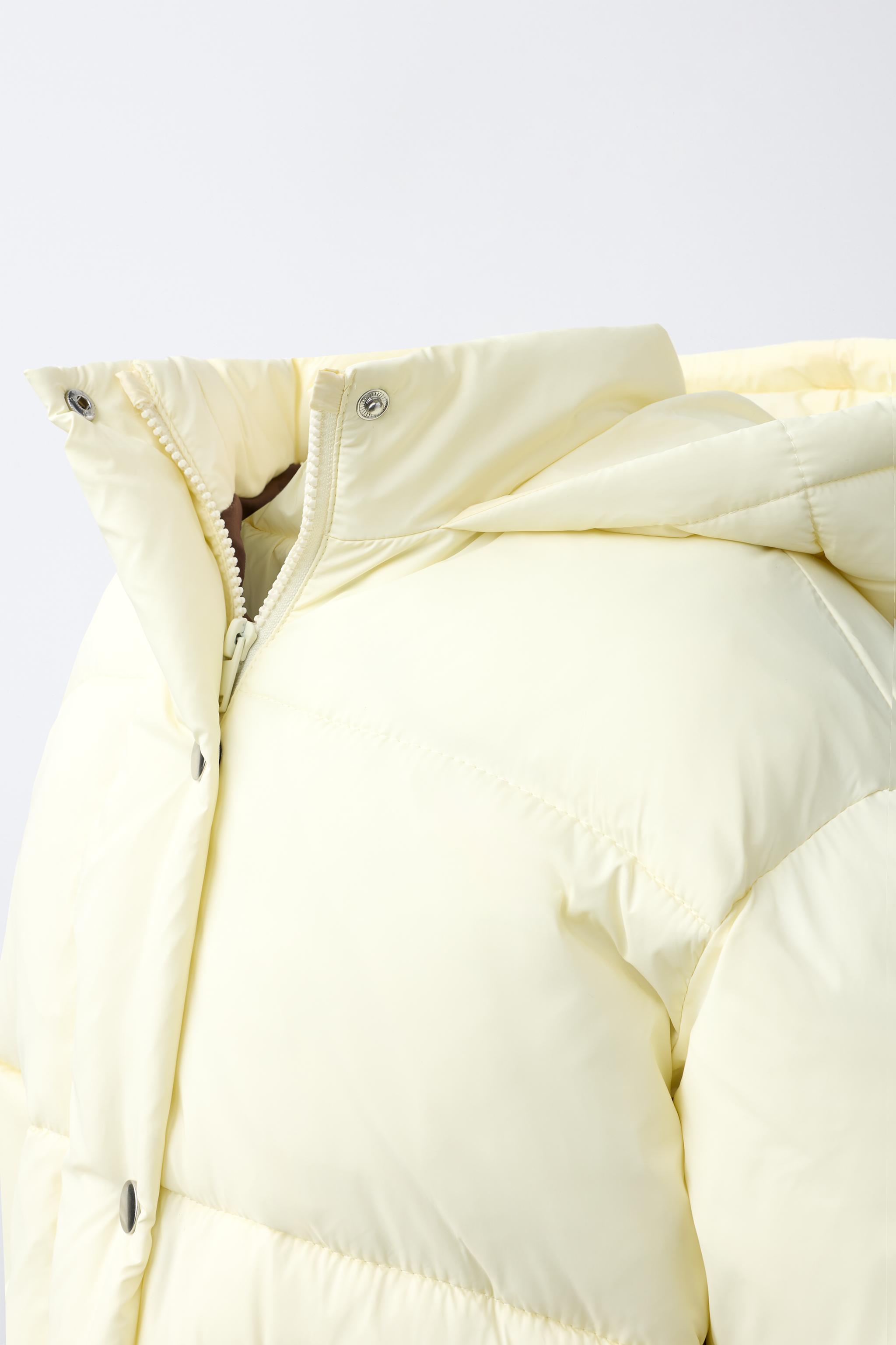 BLOUSON MATELASSÉ À CAPUCHE DÉPERLANT