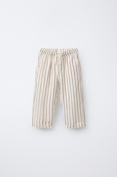 PANTALON FLUIDE EN LIN - Écru / Noir de Zara - Image 0