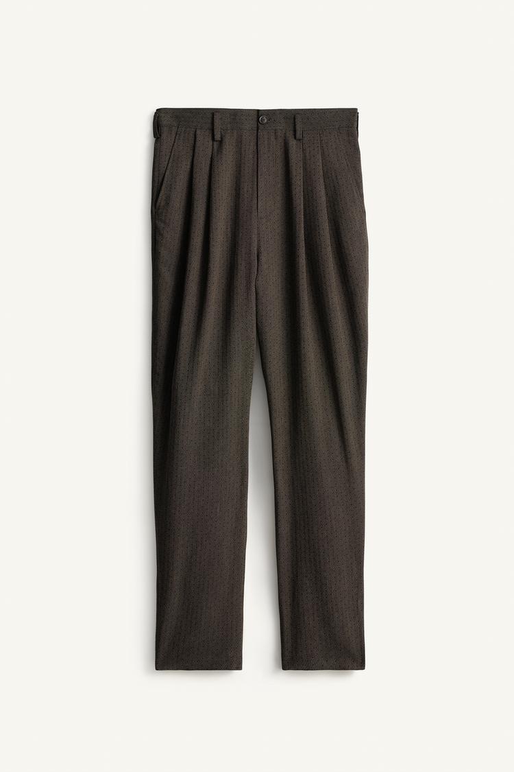 Pantalon jacquard geometrico pliegues