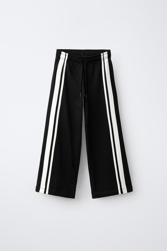 WIDE-LEG TROUSERS WITH TAPING - Black by Zara - Image 0