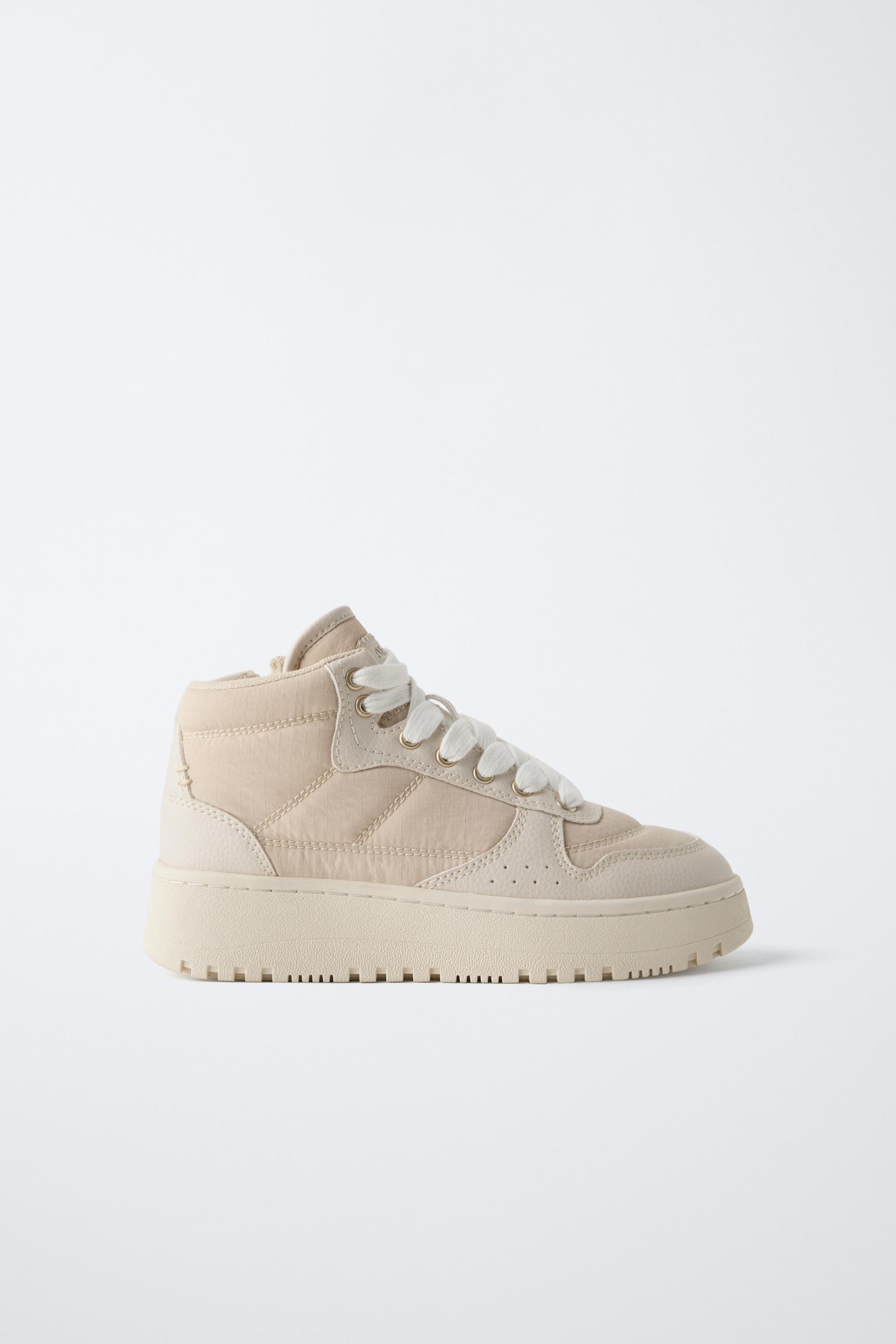 zara high low top