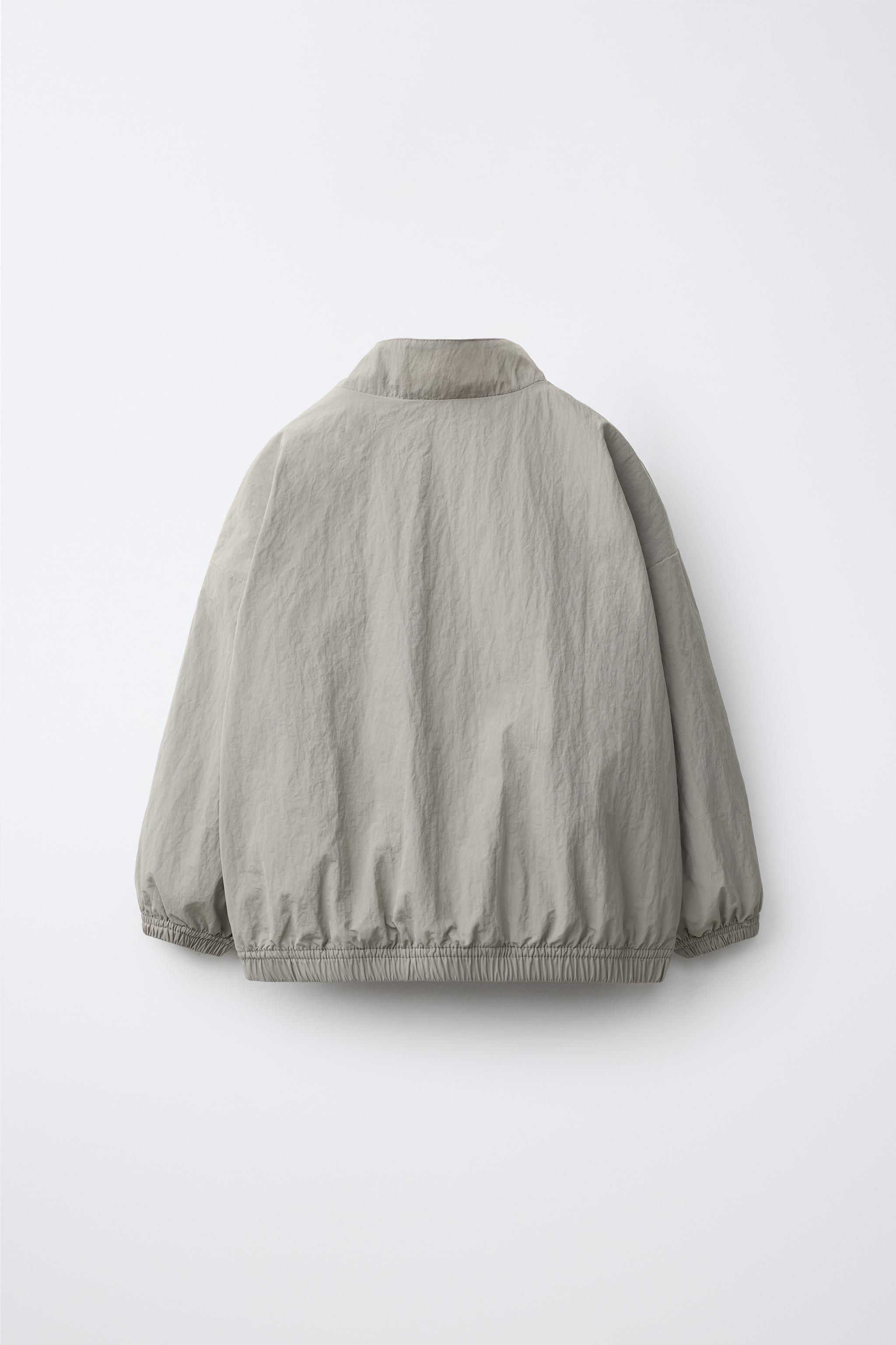 TECHNICAL ZIP-UP JACKET
