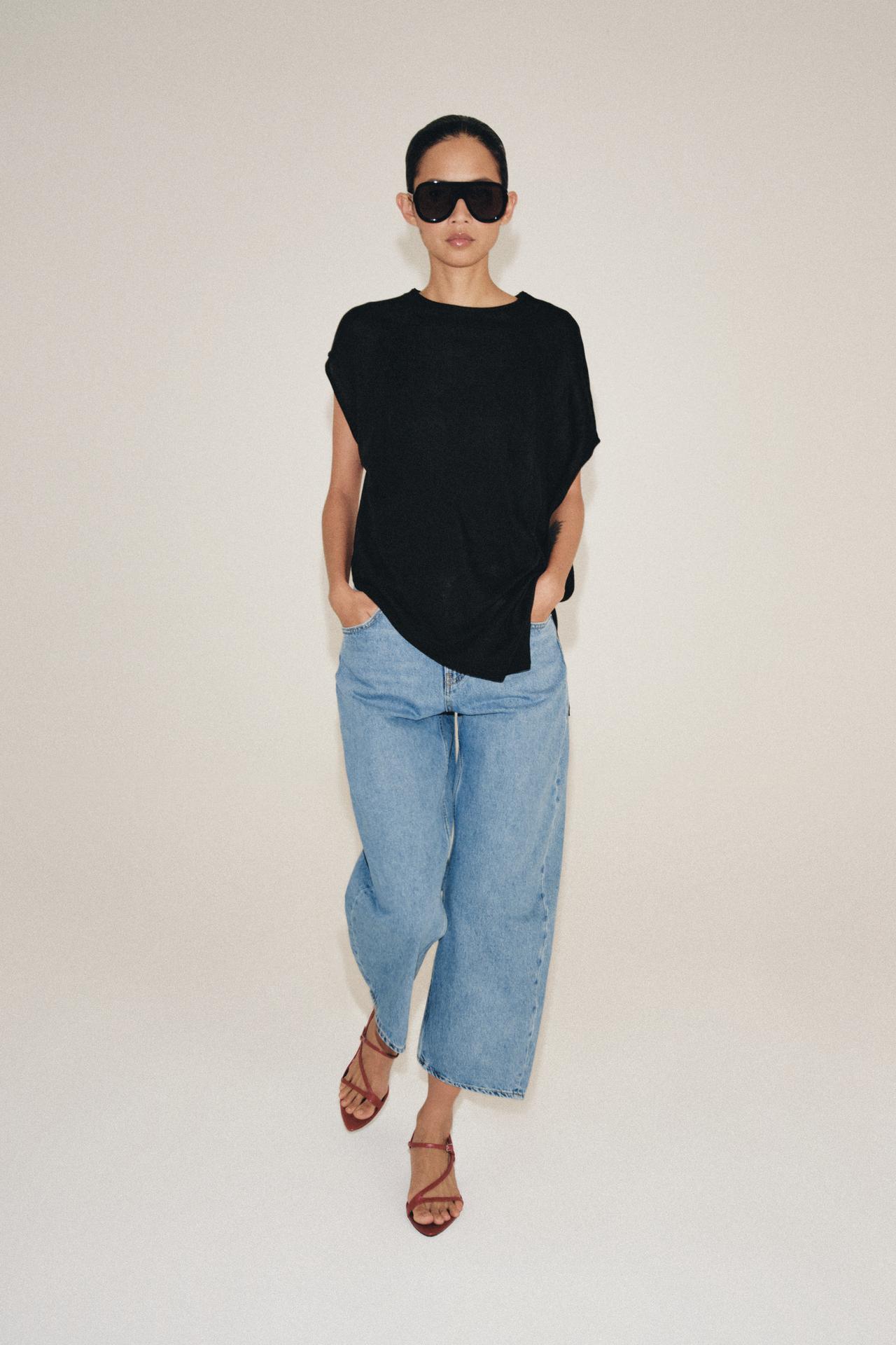 ASYMMETRIC KNIT TOP — Black
