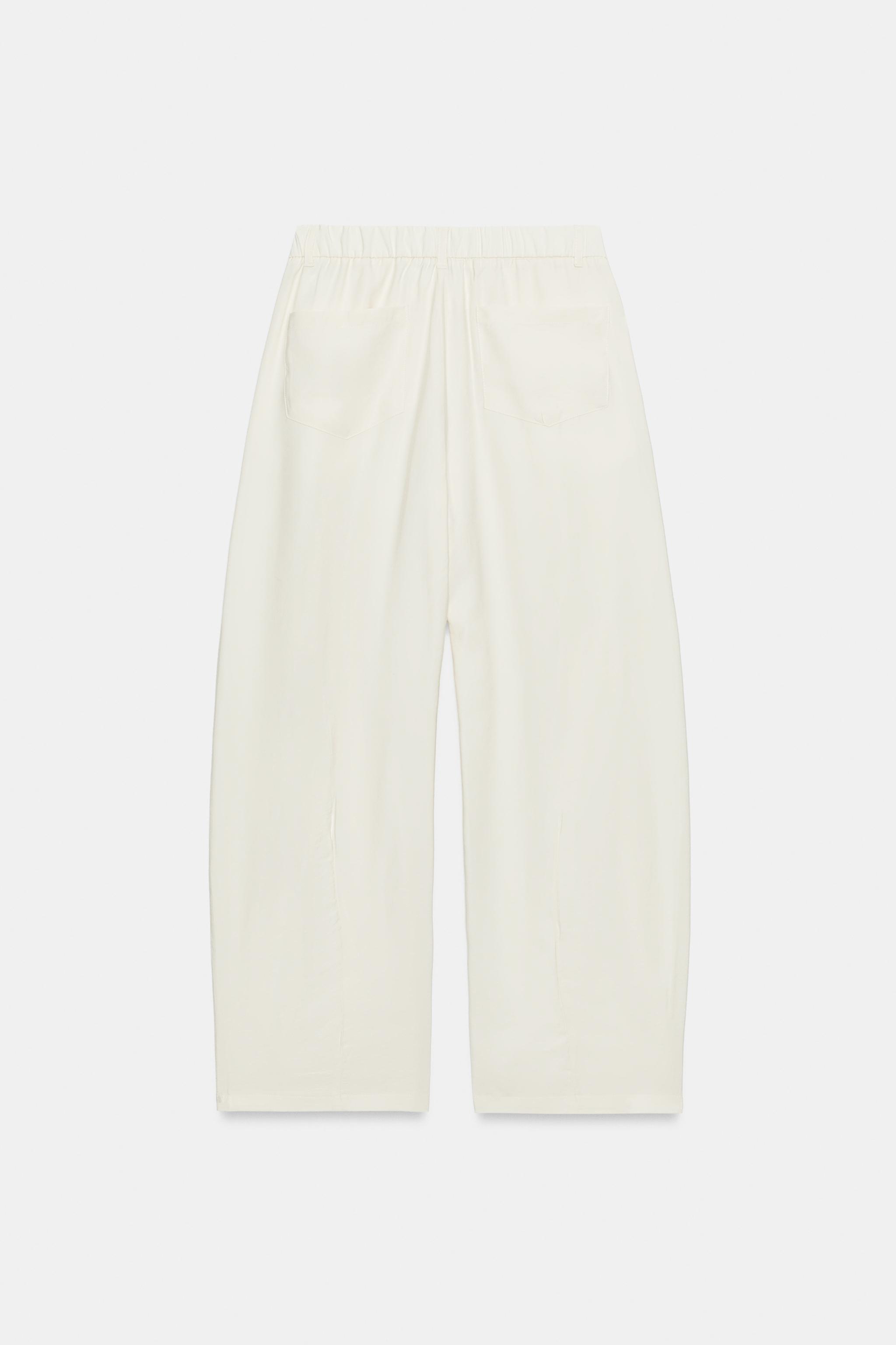 FLOWY PLEATED PANTS