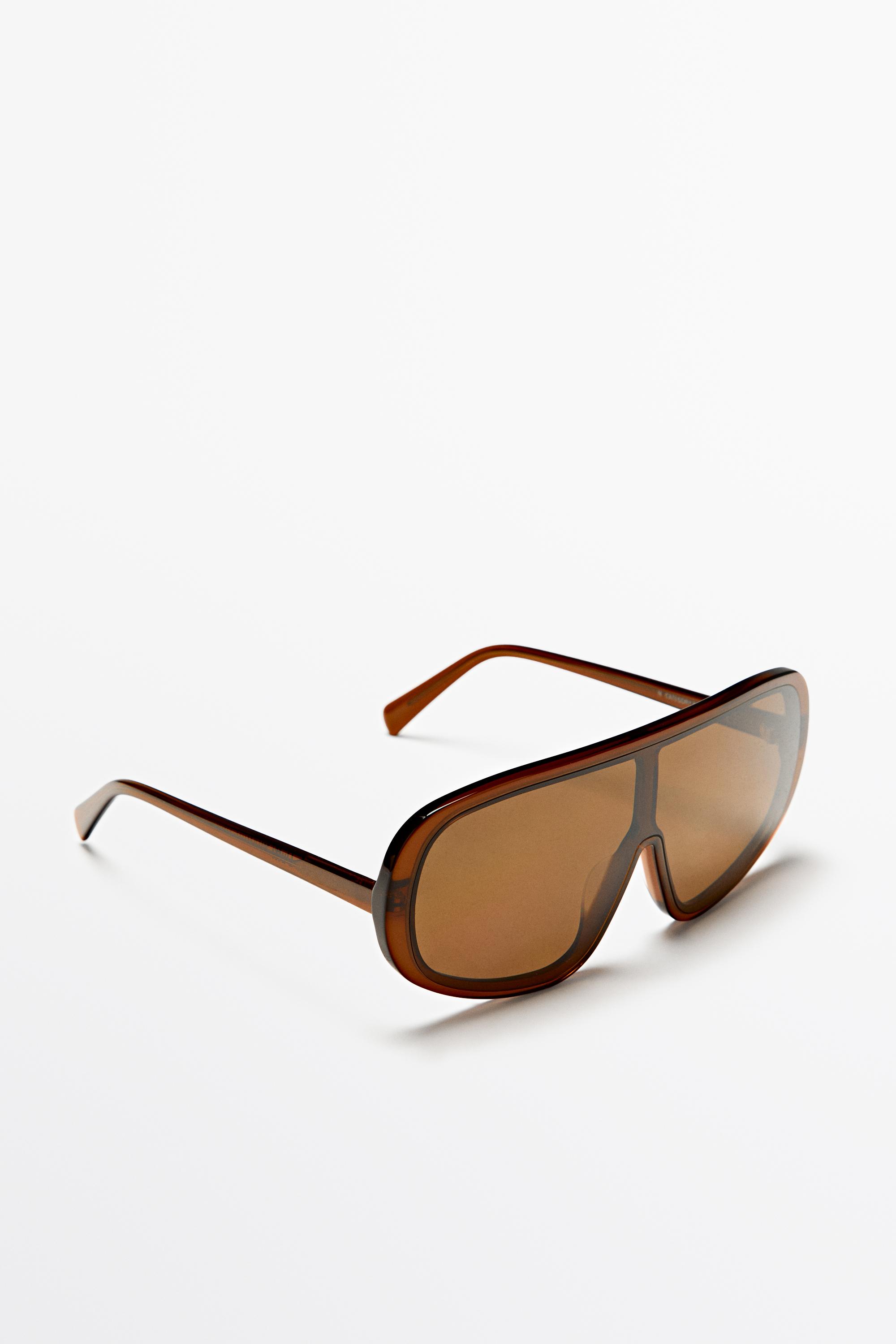 Lunettes de soleil enveloppantes oversize