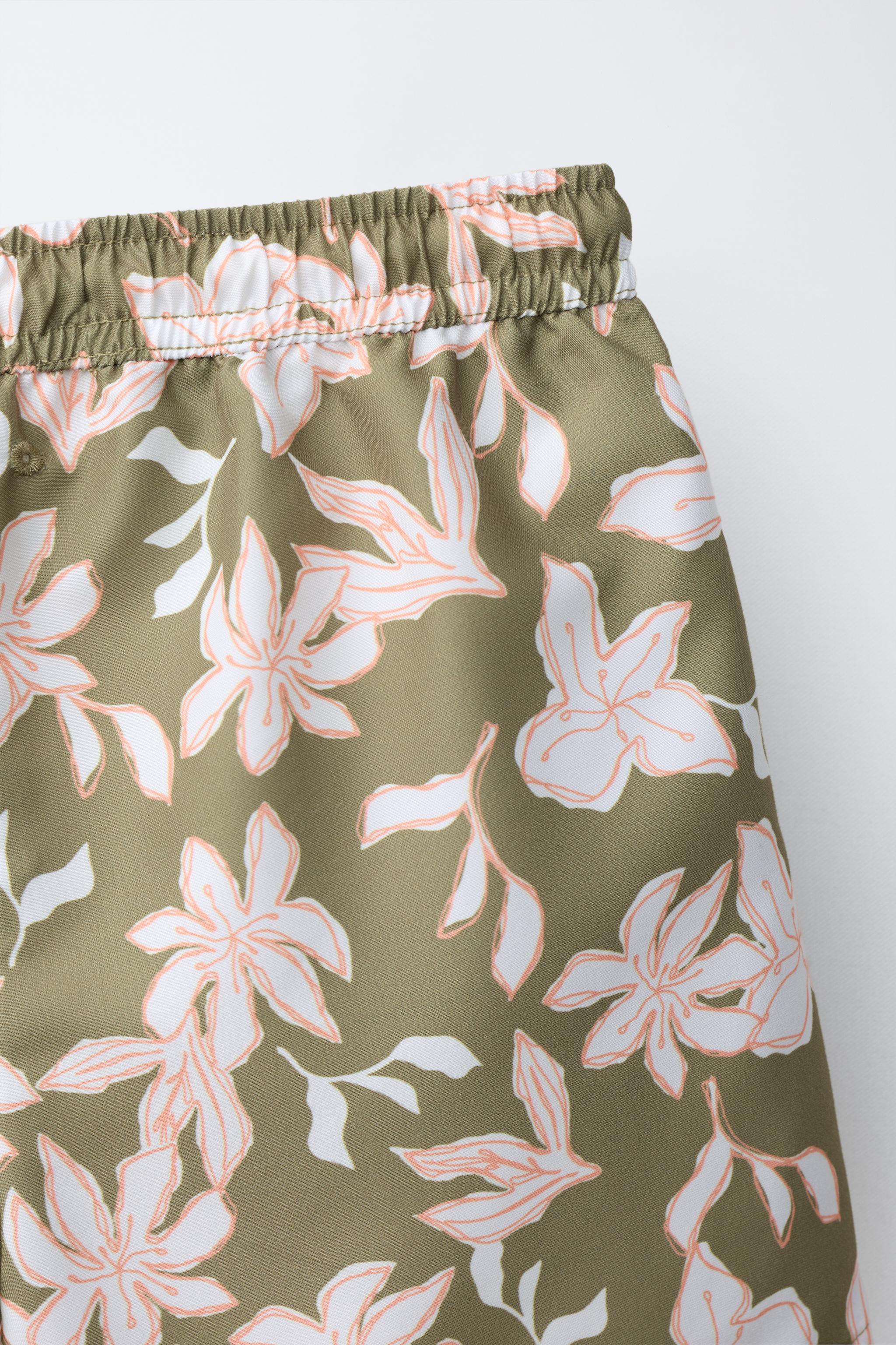 6-14 YEARS / FLORAL SWIM SHORTS