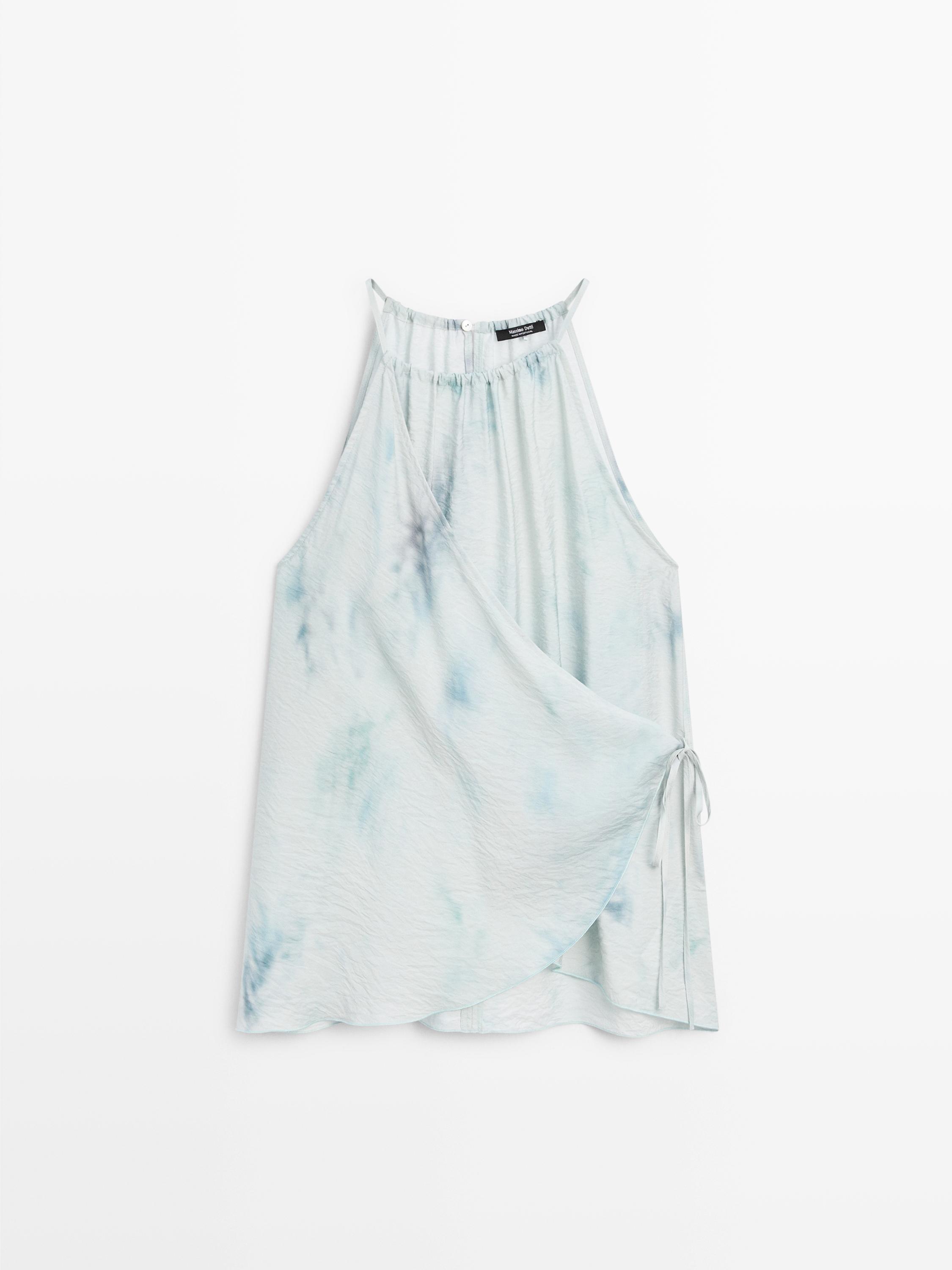 Flowing halterneck top with tie detail