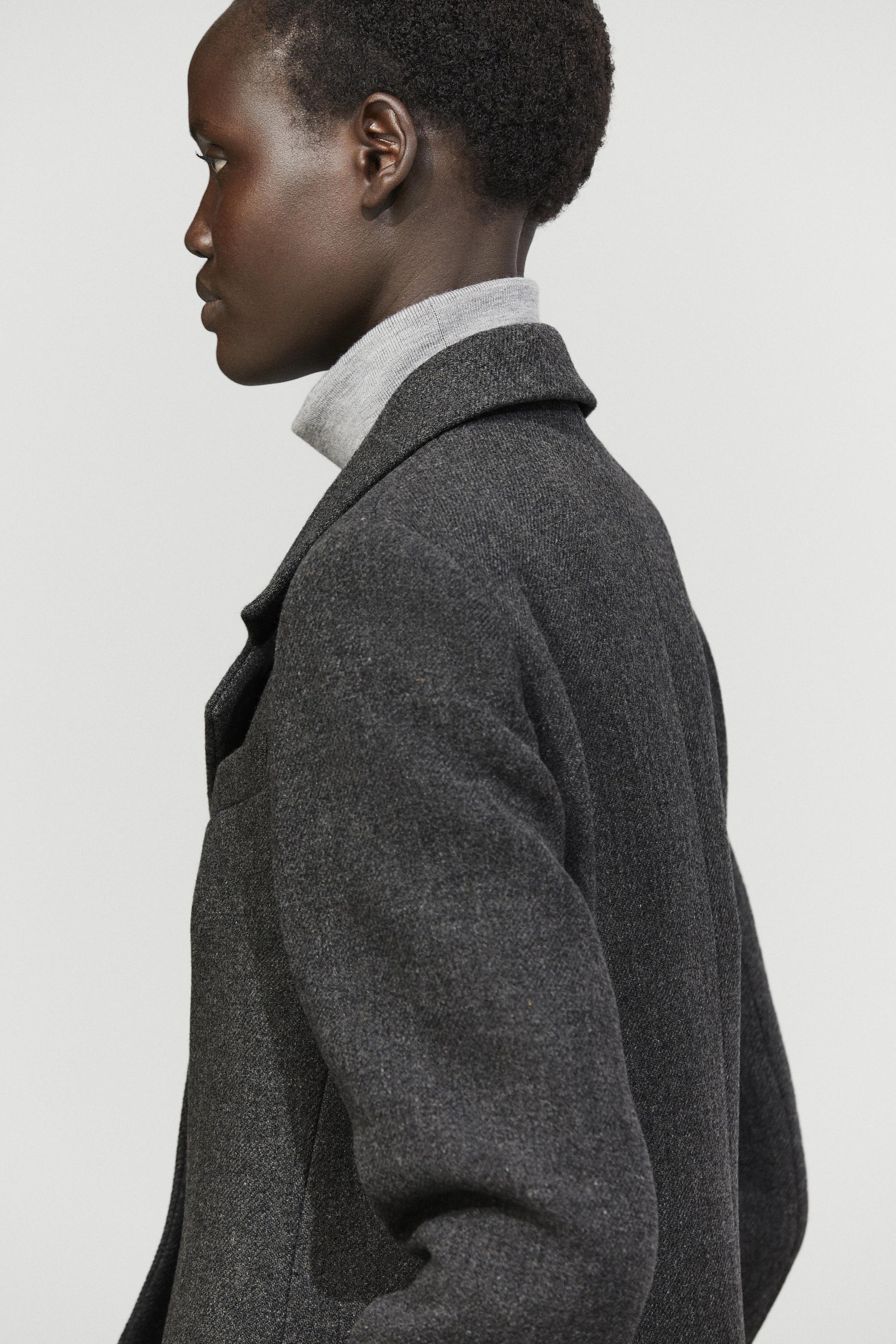 Manteau en tissu bouclé mélangé de laine