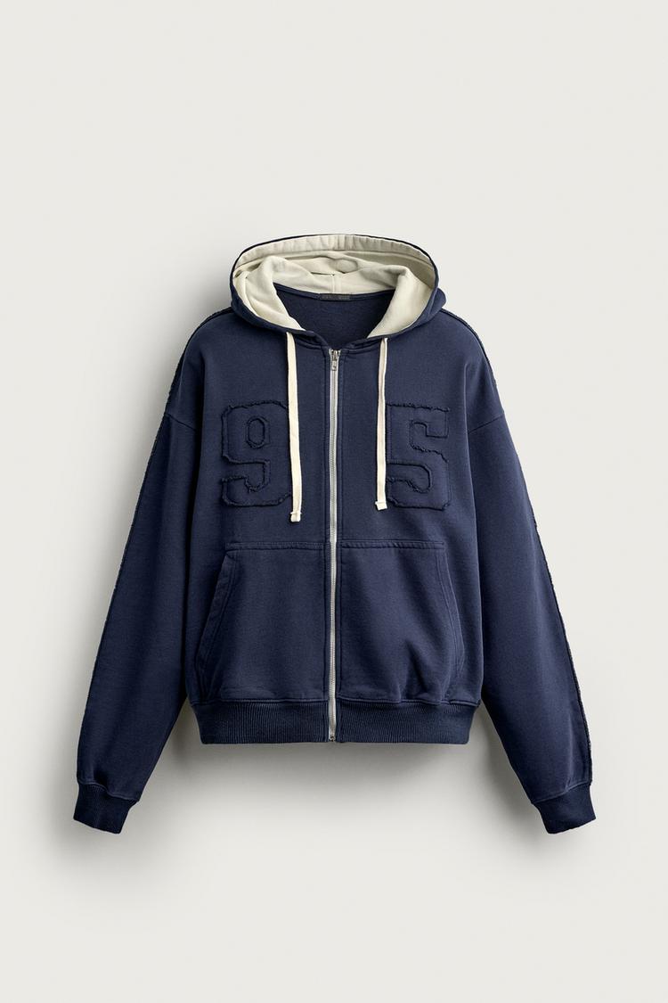 Sudadera relaxed fit contraste parches