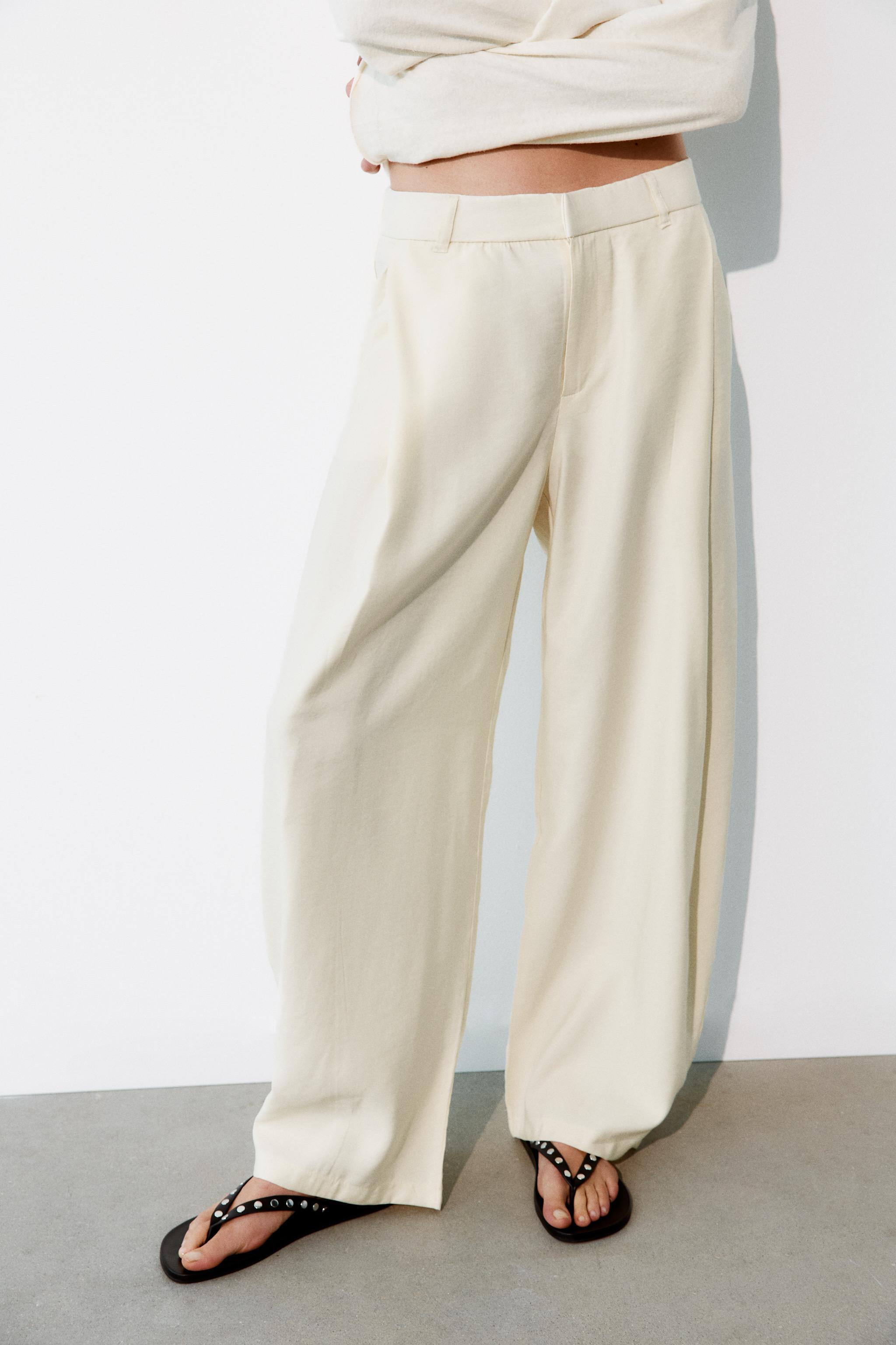FLOWY PLEATED PANTS