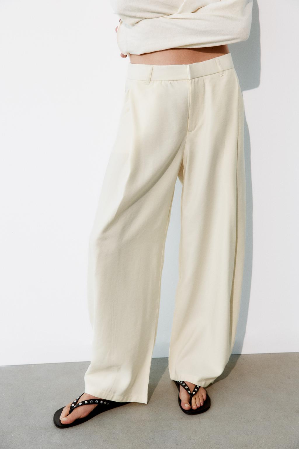 FLOWING PLEATED TROUSERS