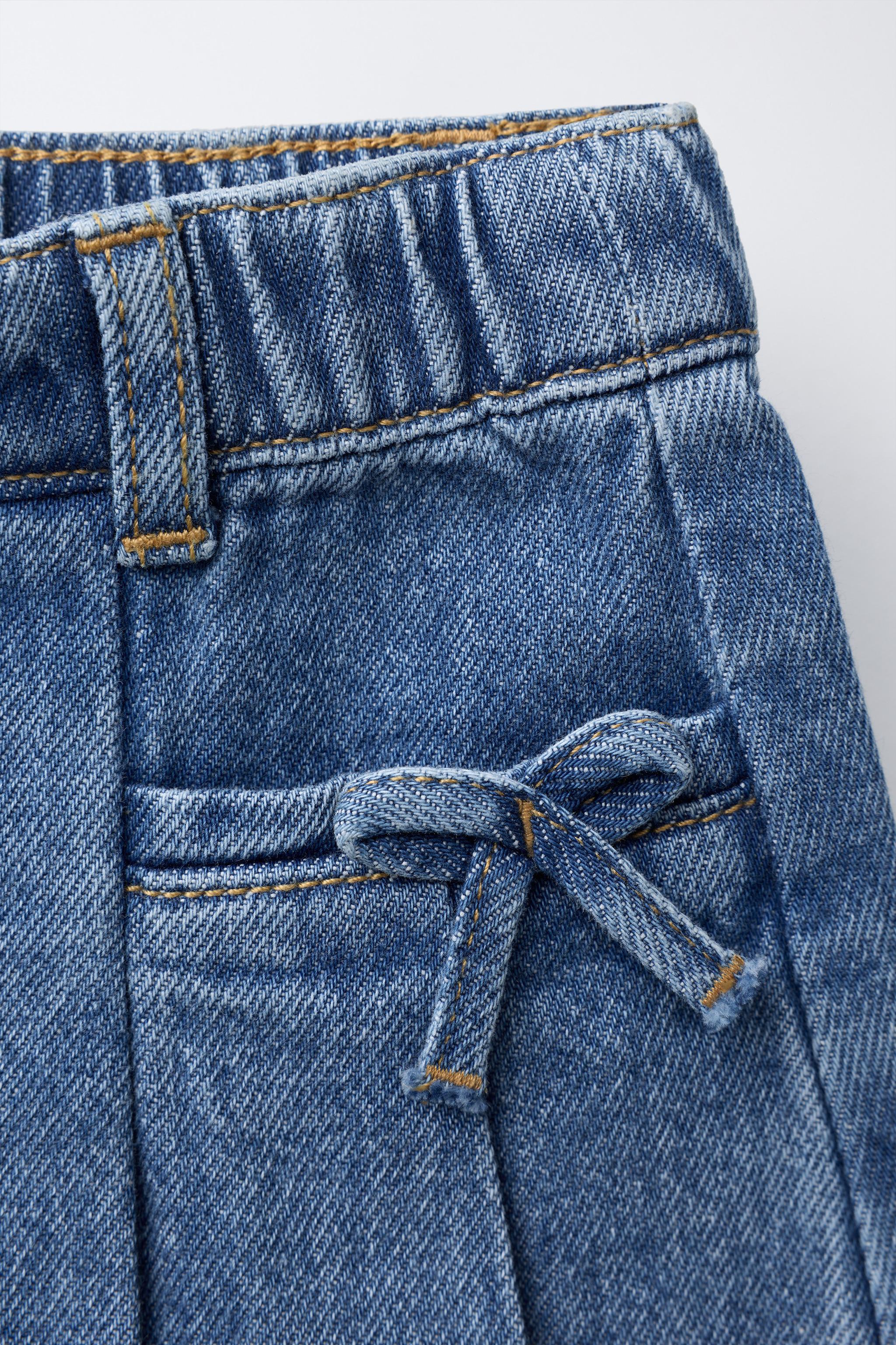 JUPE EN DENIM À PLIS PLATS ET LACETS