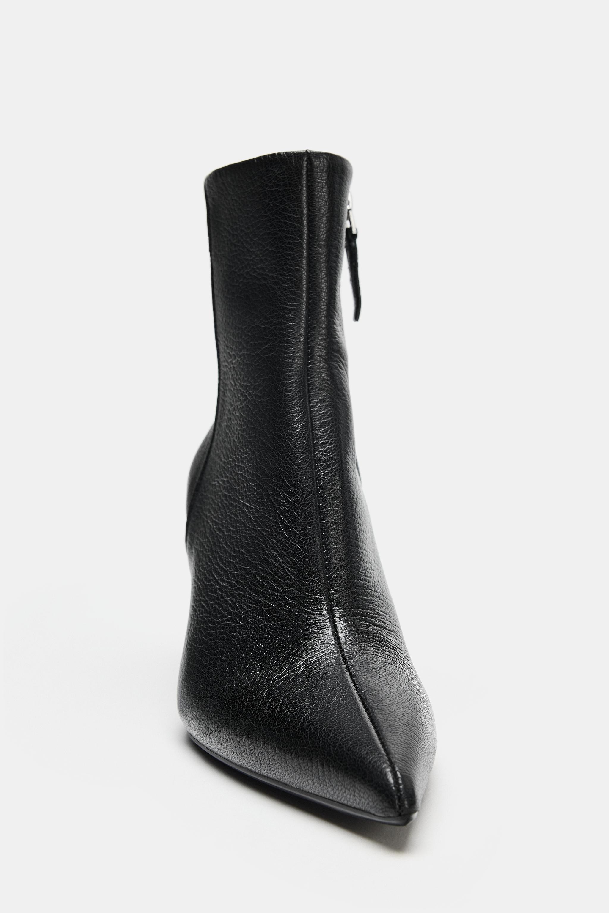 BOTTINES À TALONS EN CUIR